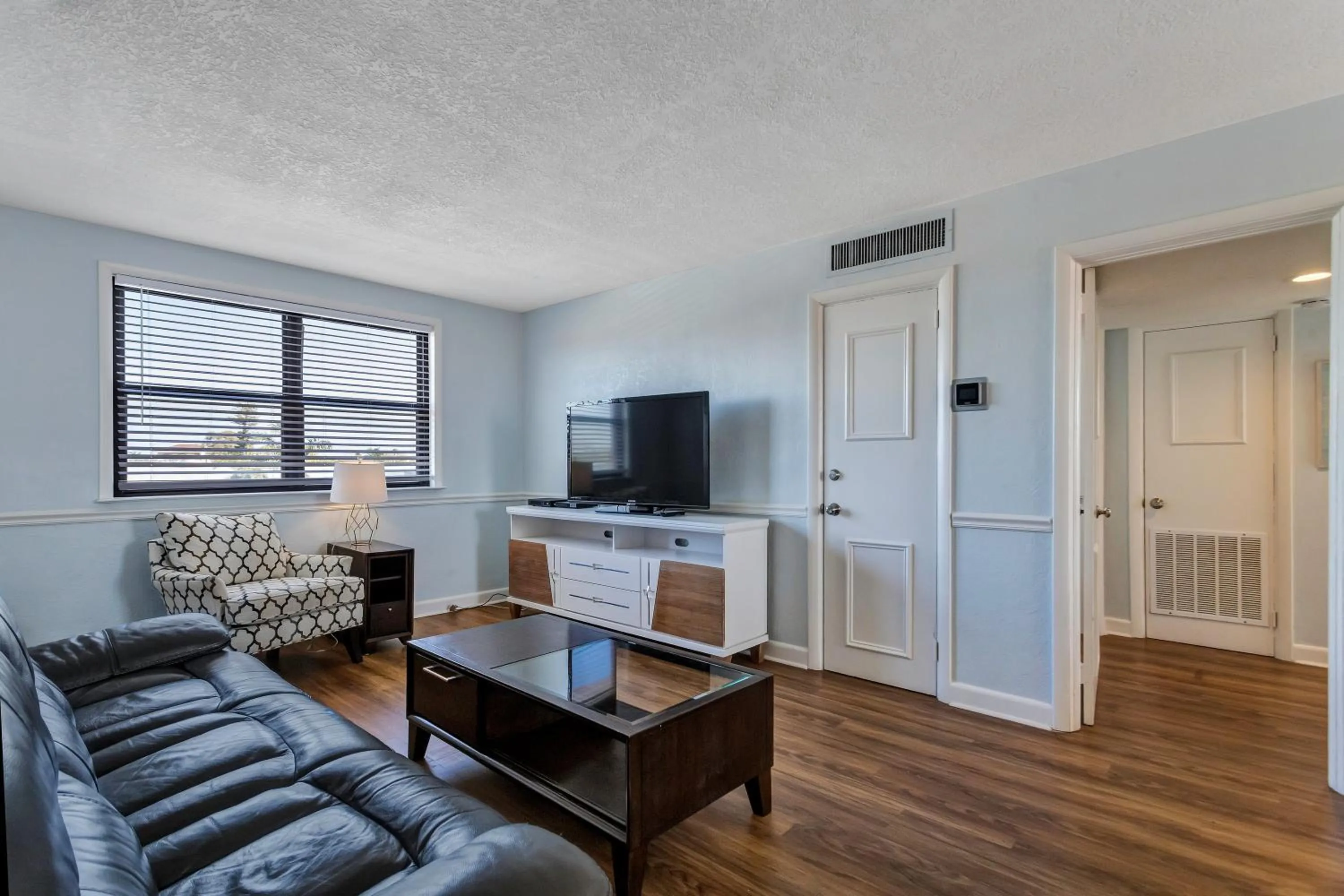 Living room in Gulf Winds Resort by Travel Resort Services