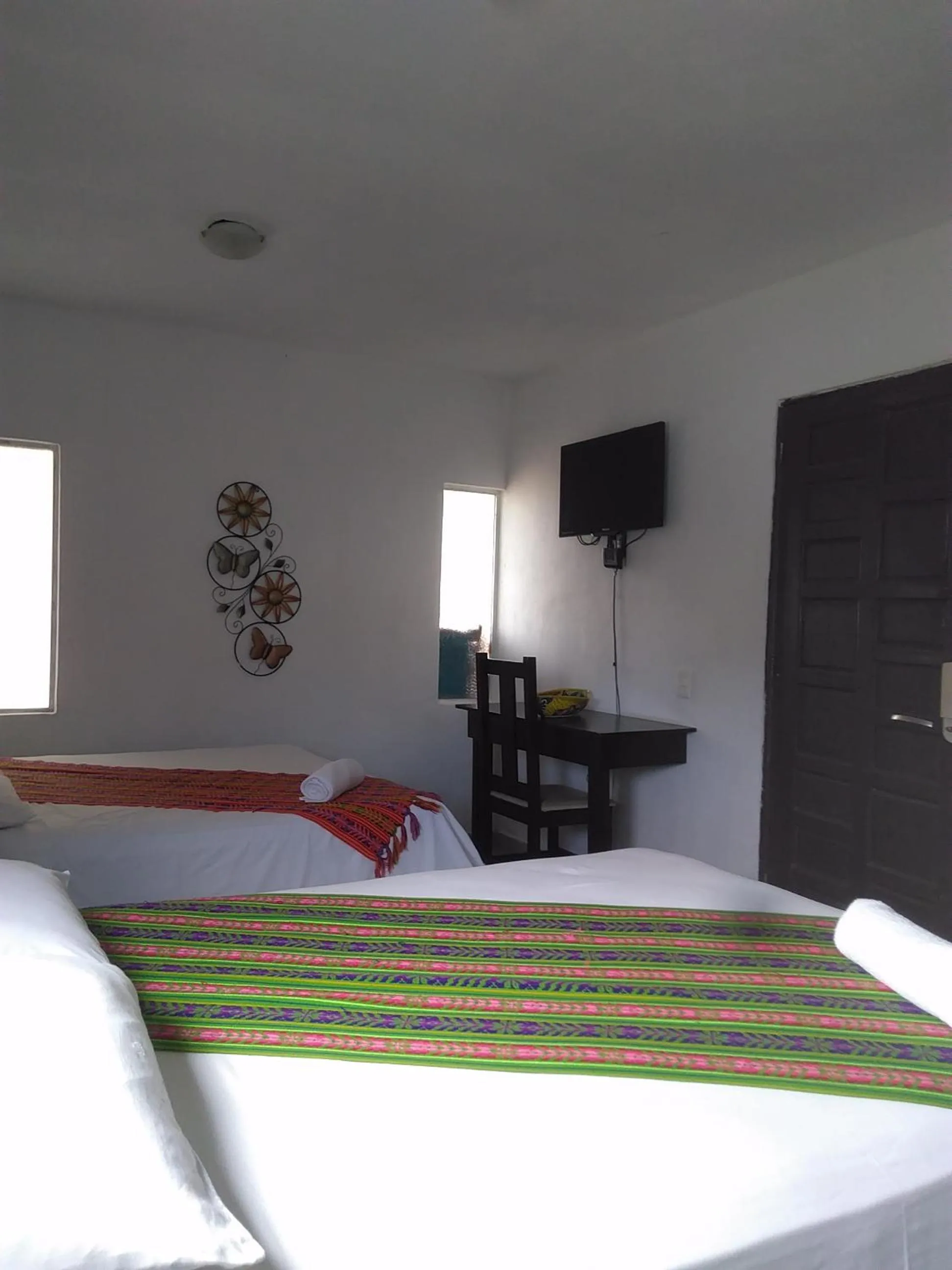 Bed in Buenos Días Guest House