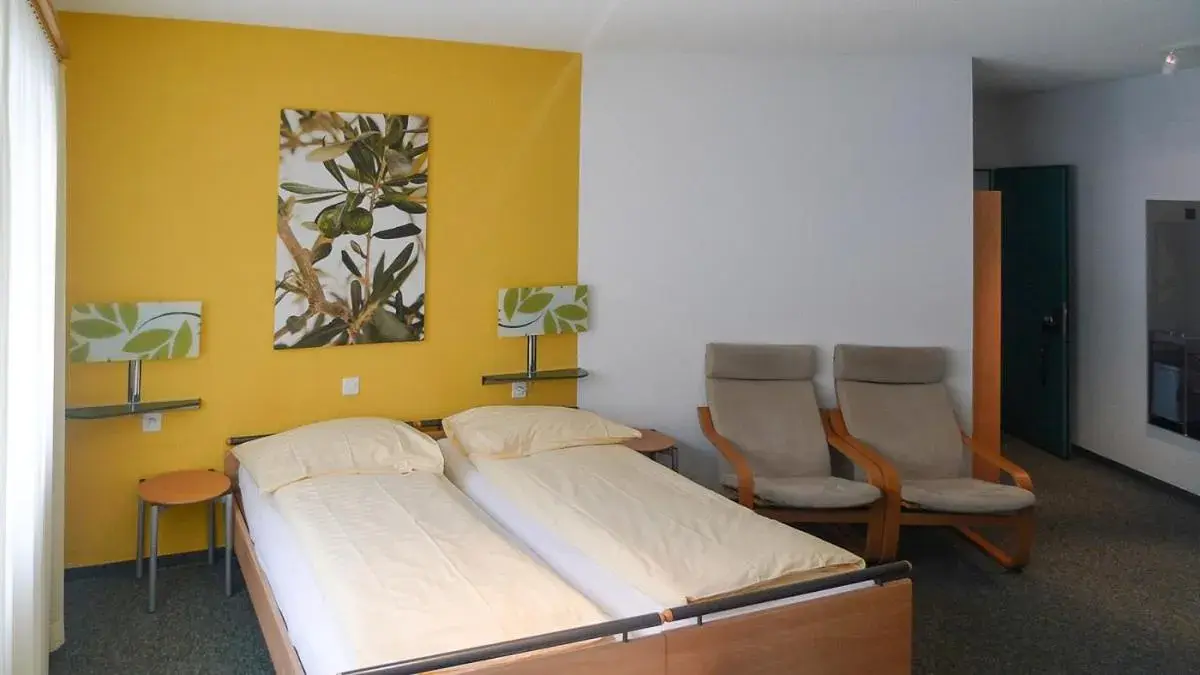 Triple Room with Mountain View in Hotel Oberland Triple Room with Mountain View in Hotel Oberland