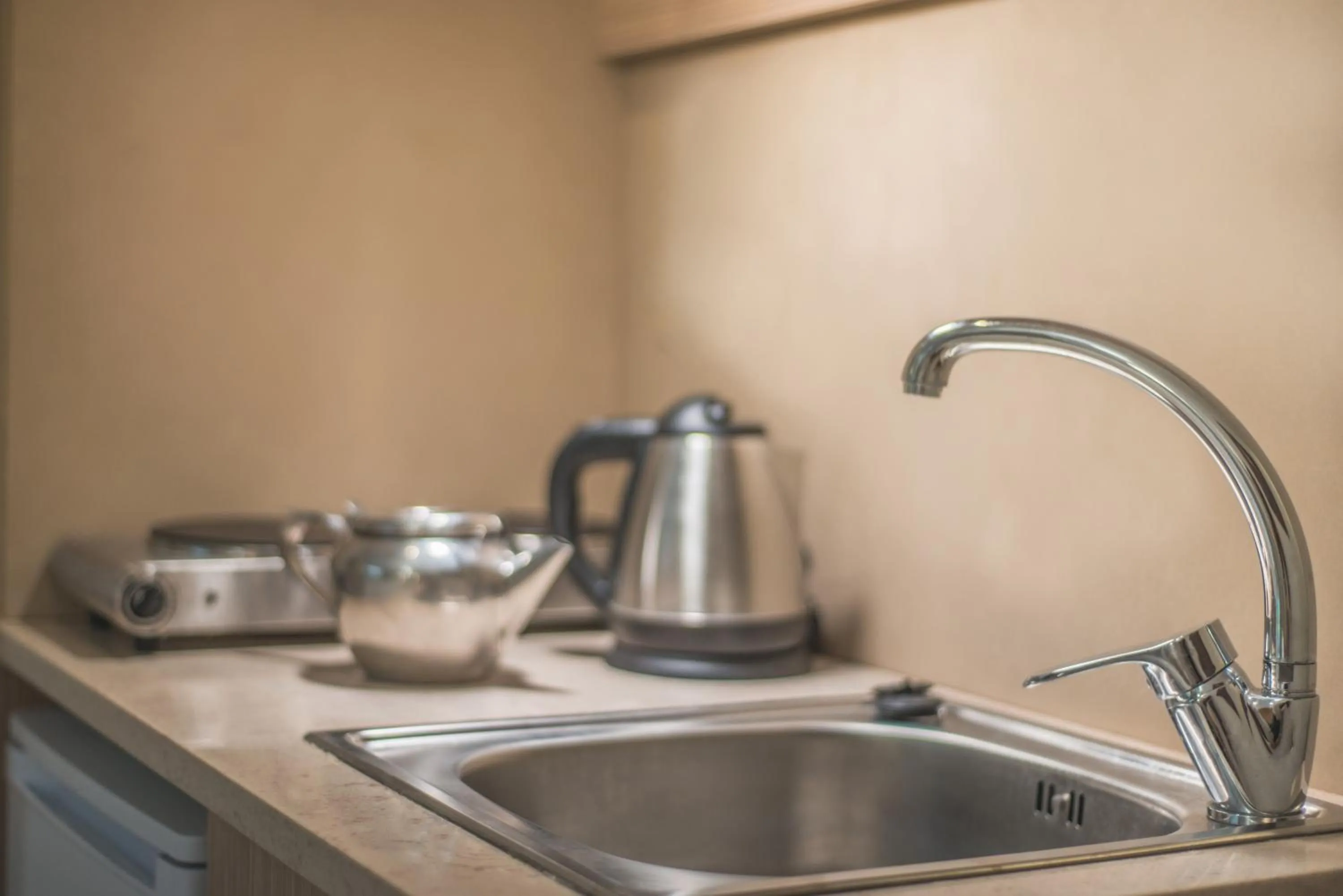 Kitchen or kitchenette in Stefania Studios by Estia