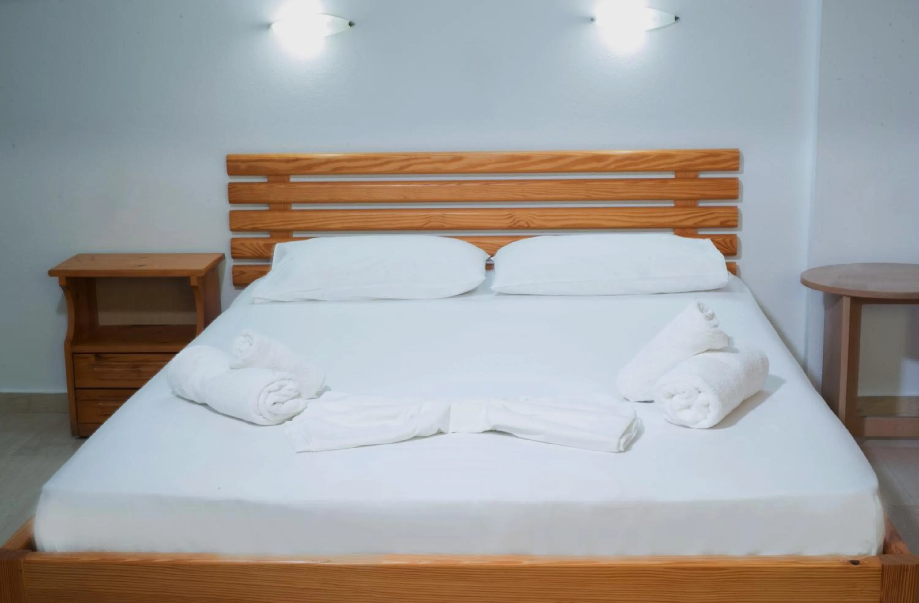 Bed in Stefania Studios by Estia