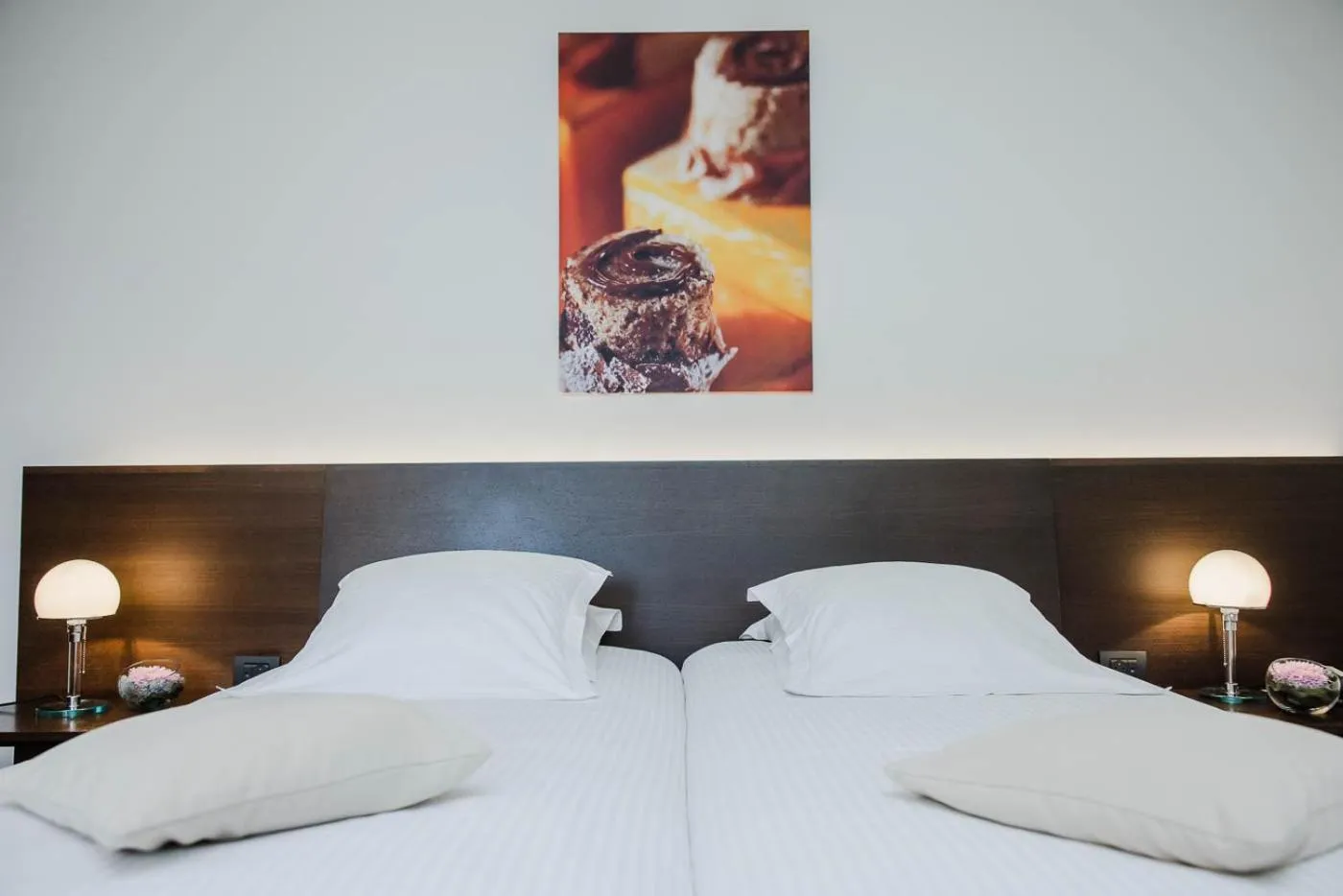 Bed in Hotel Verlooy