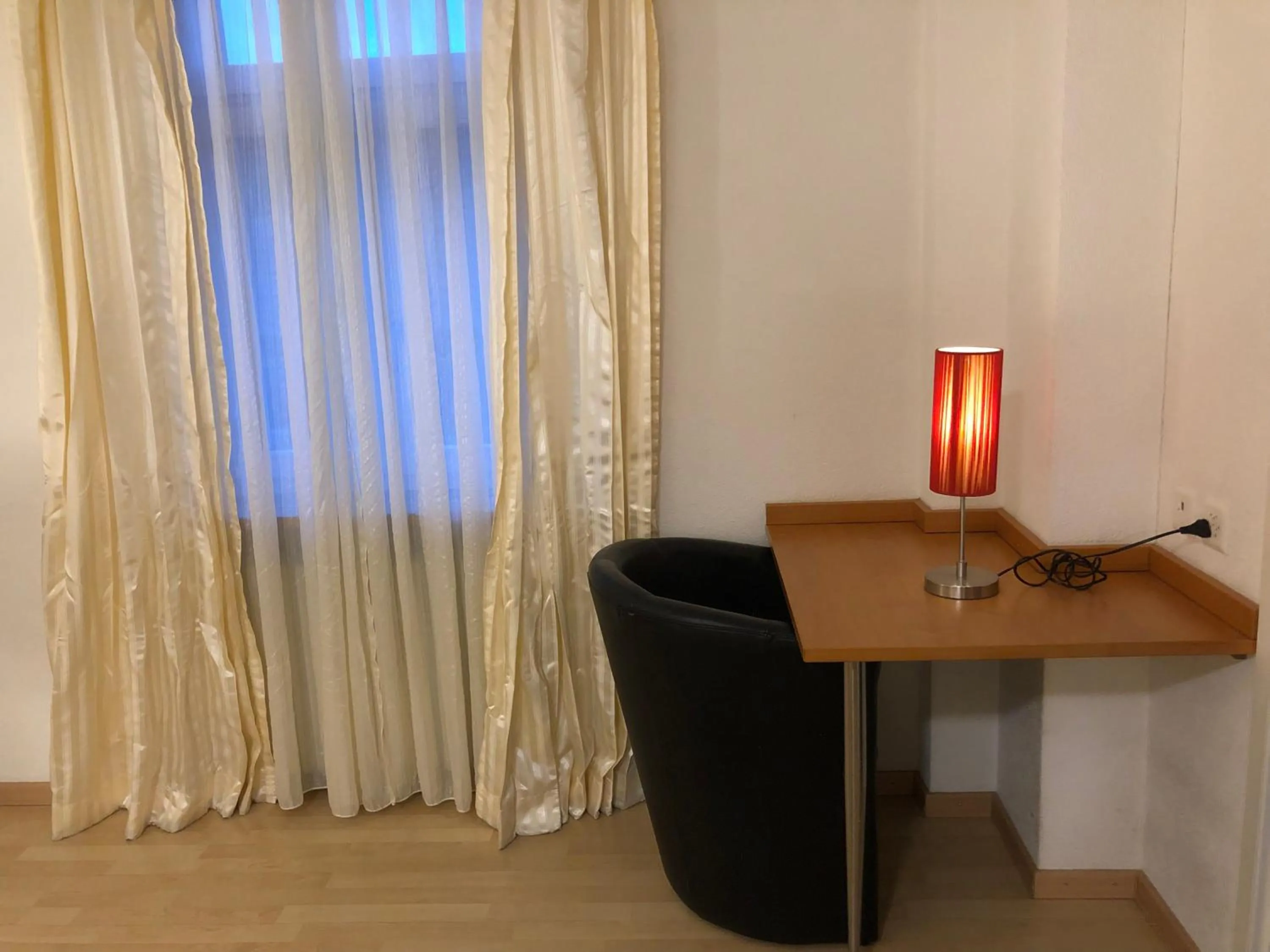 Seating area in SASS APARTHOTEL