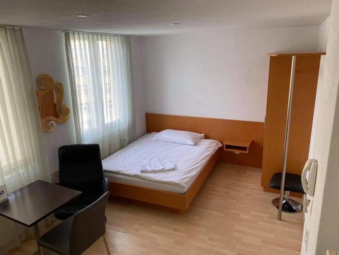 Bed in SASS APARTHOTEL