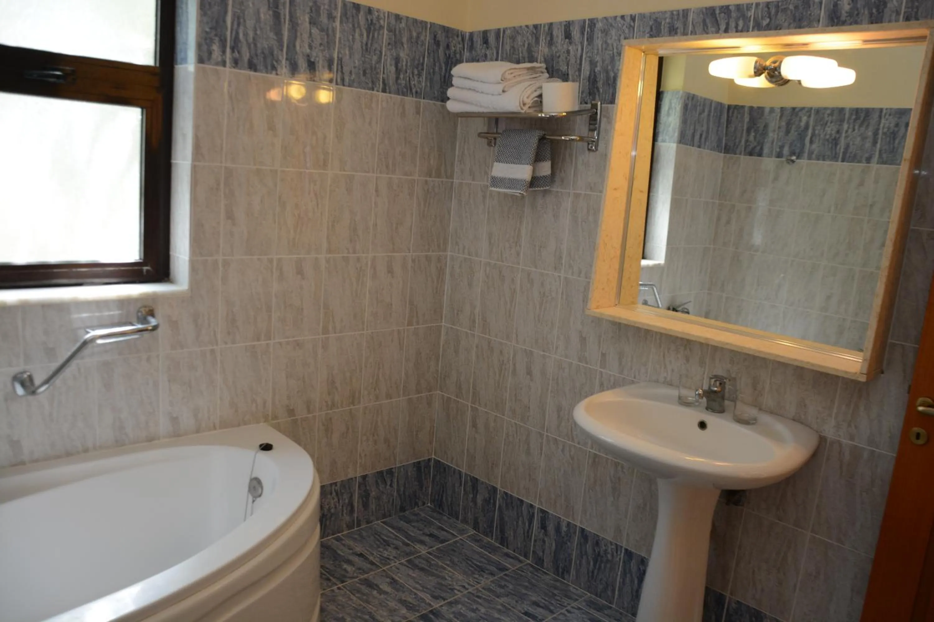 Bathroom in Niki Hotel Apartments