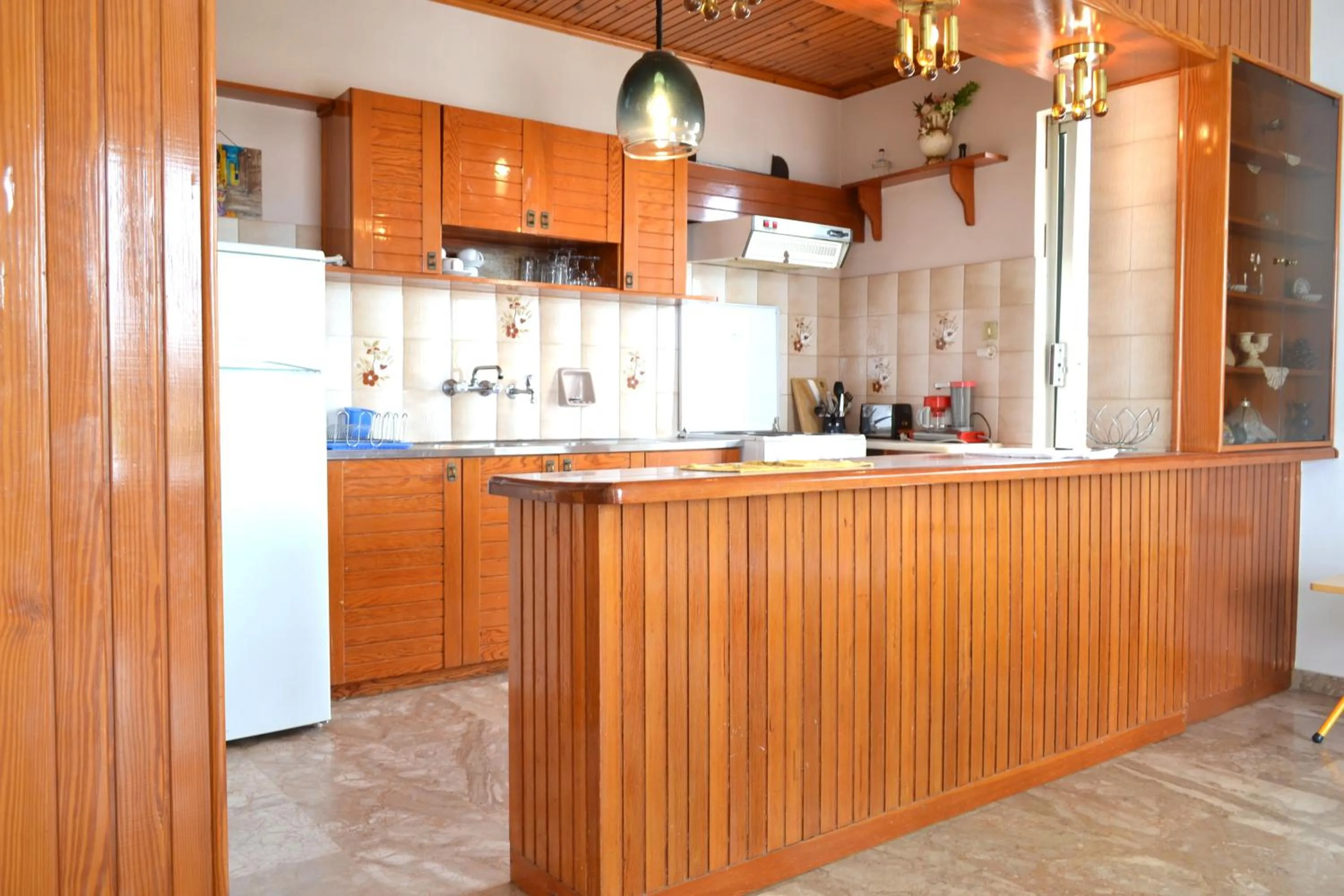 Kitchen or kitchenette in Oniro Apartments