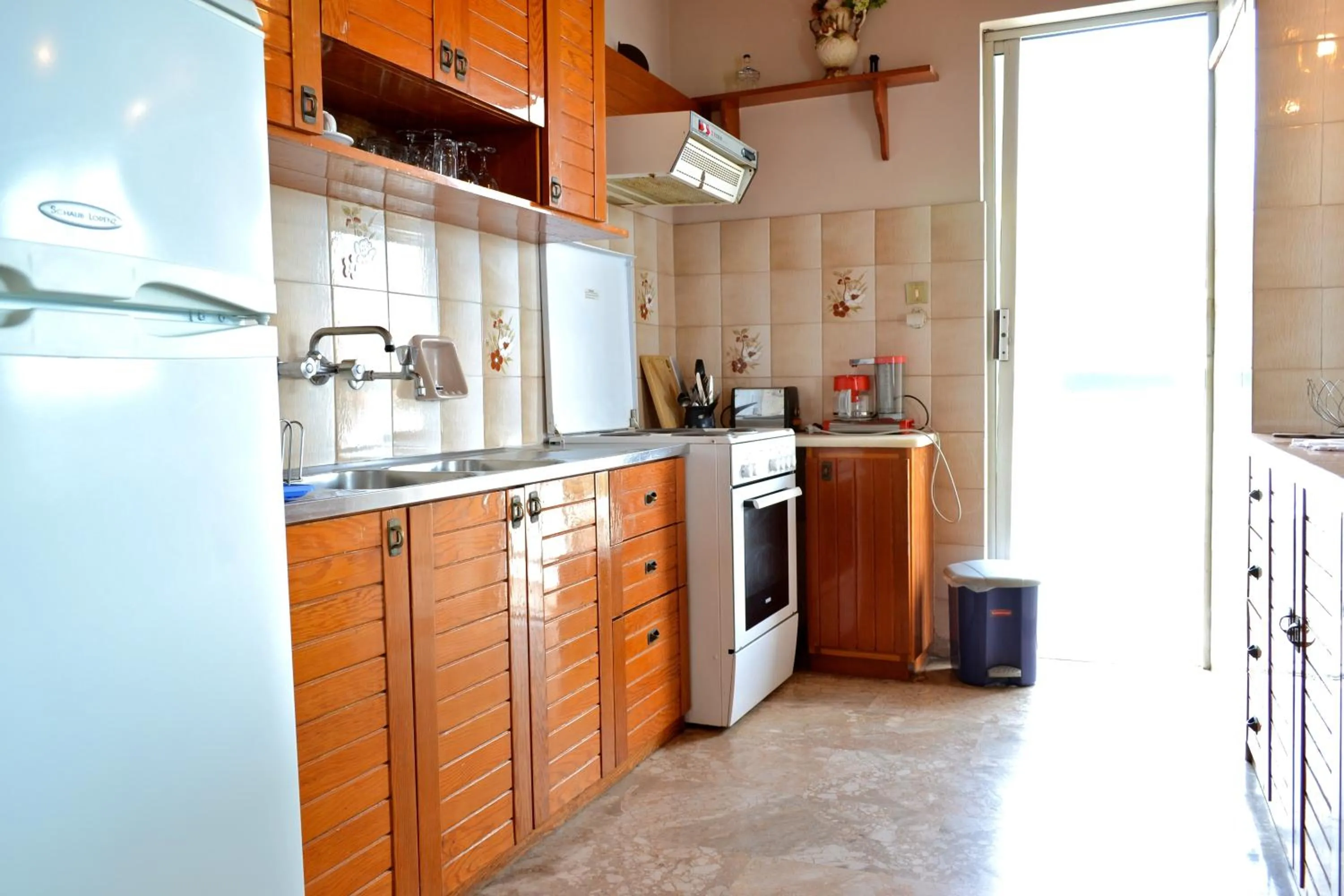 Kitchen or kitchenette in Oniro Apartments