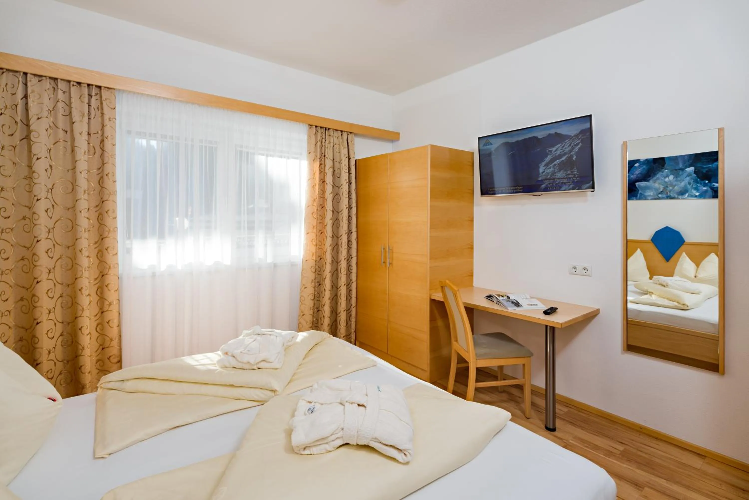 Bed in Aparthotel Alpendiamant Serfaus Wachter GmbH