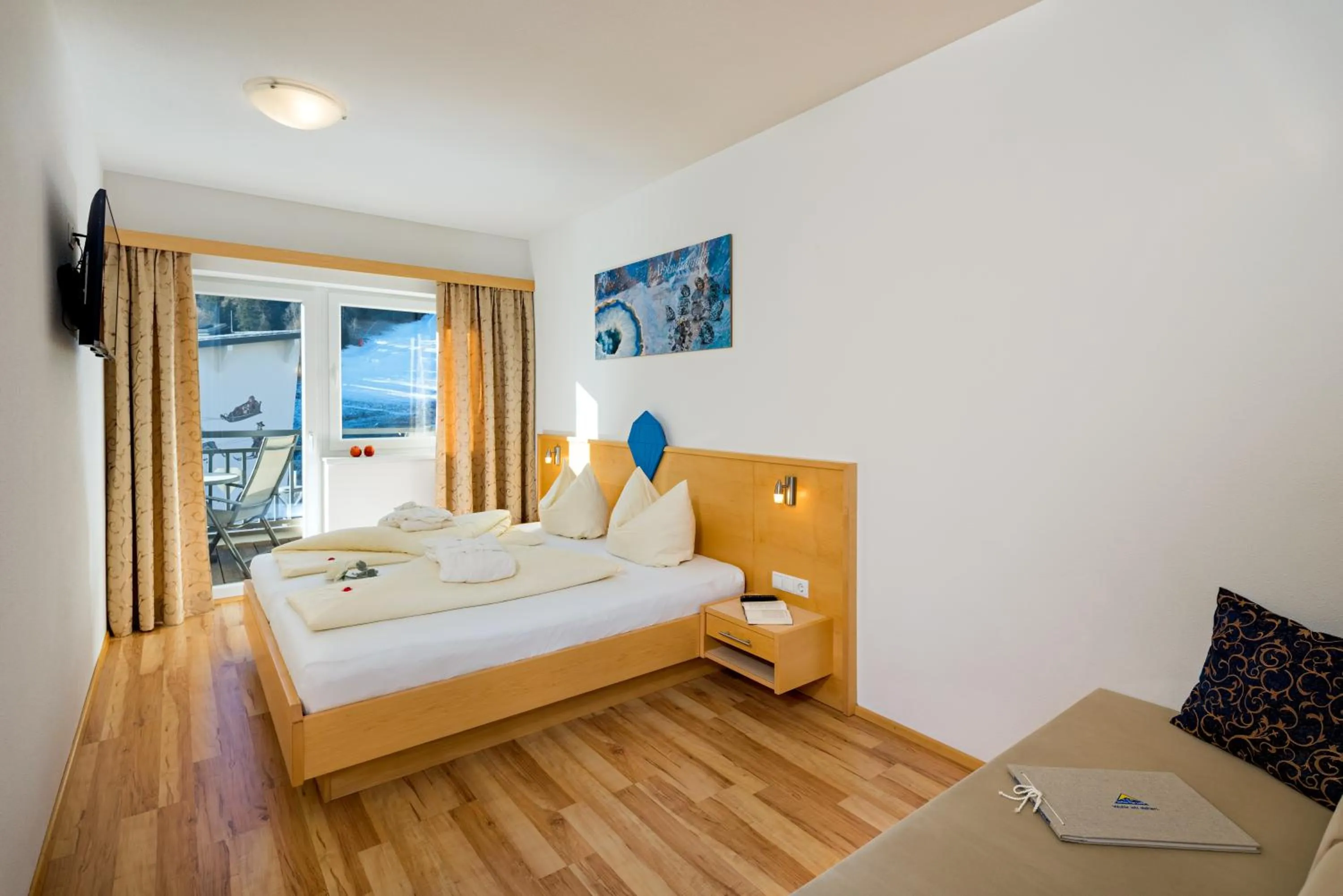 Bed in Aparthotel Alpendiamant Serfaus Wachter GmbH