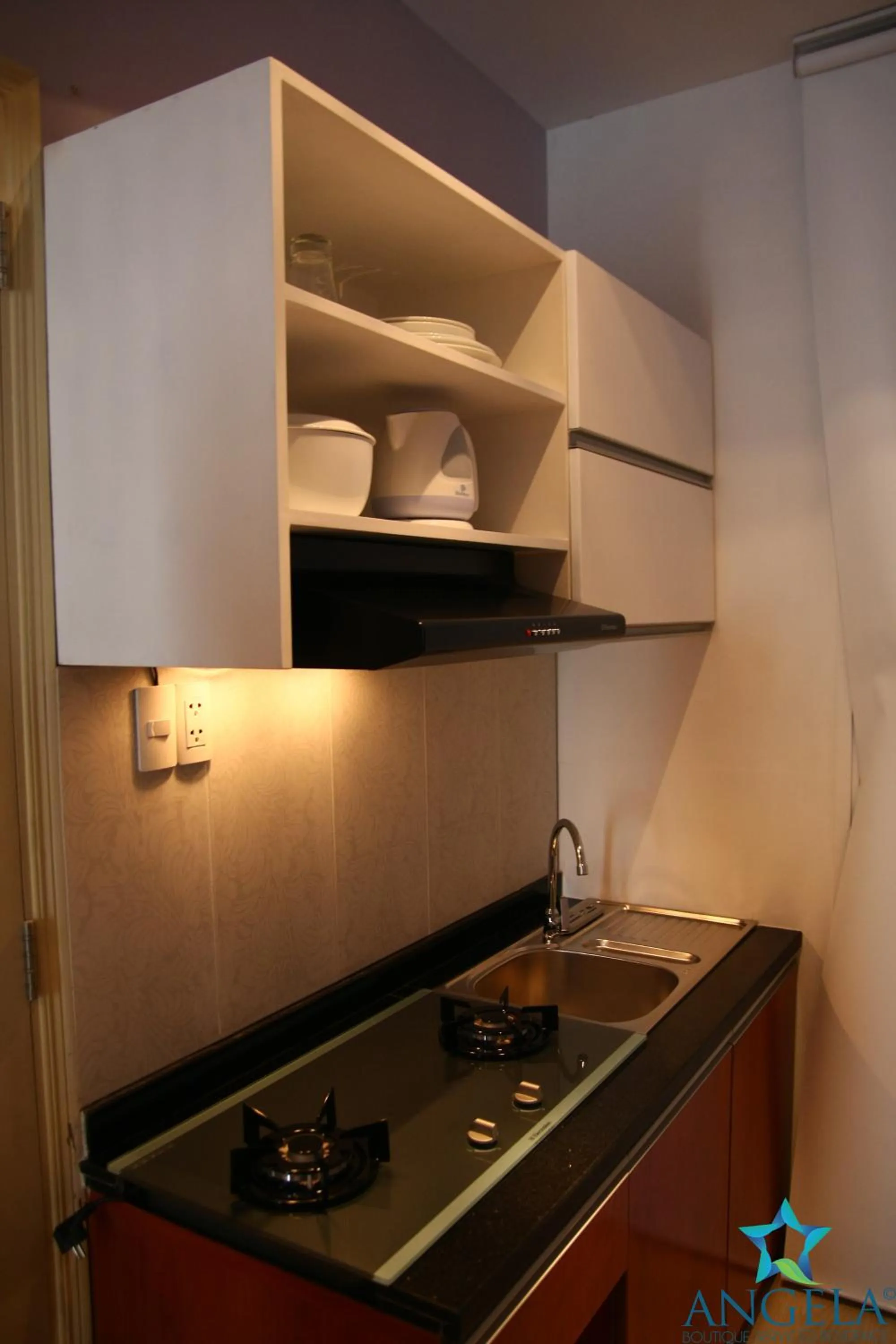 Kitchen or kitchenette in Angela Boutique Serviced Residence