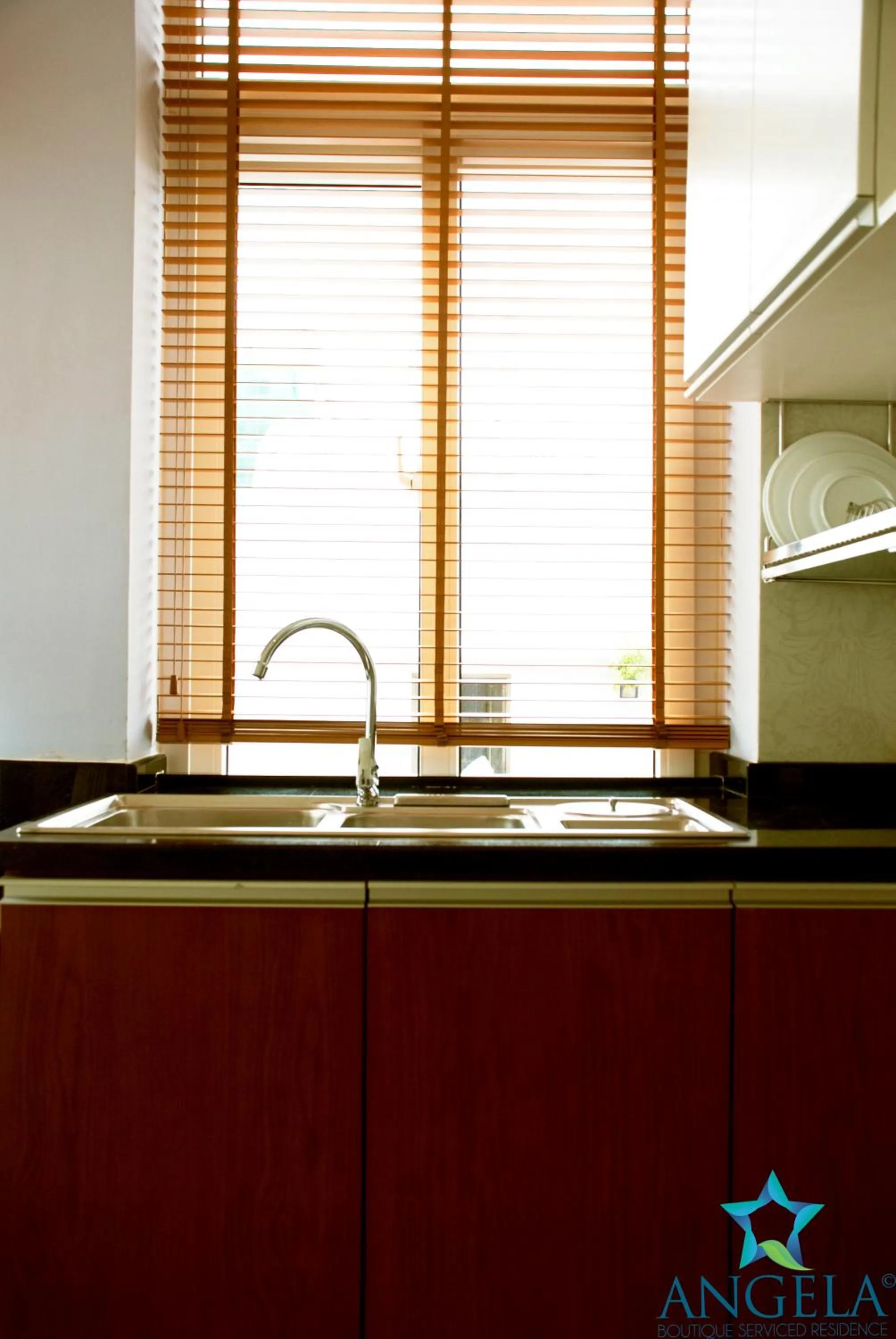Kitchen or kitchenette in Angela Boutique Serviced Residence
