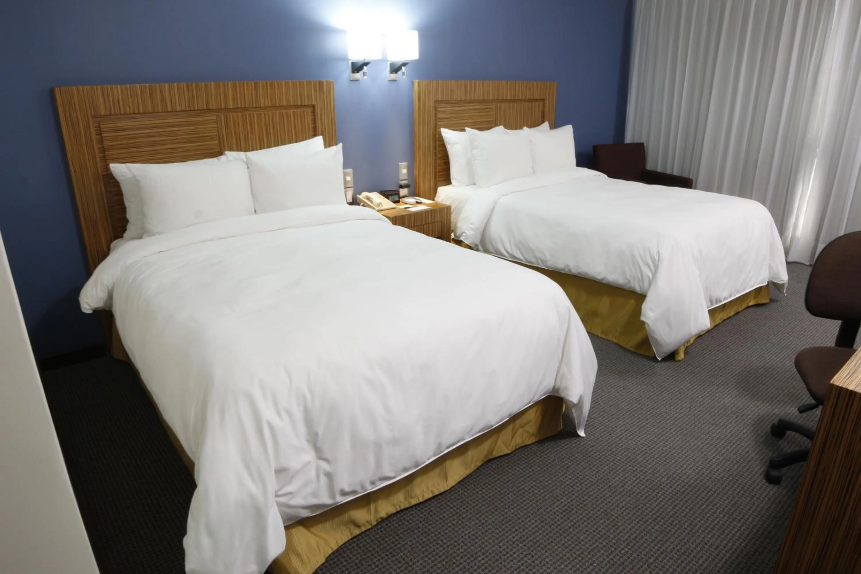 Bed in Radisson Hotel & Convention Center Toluca