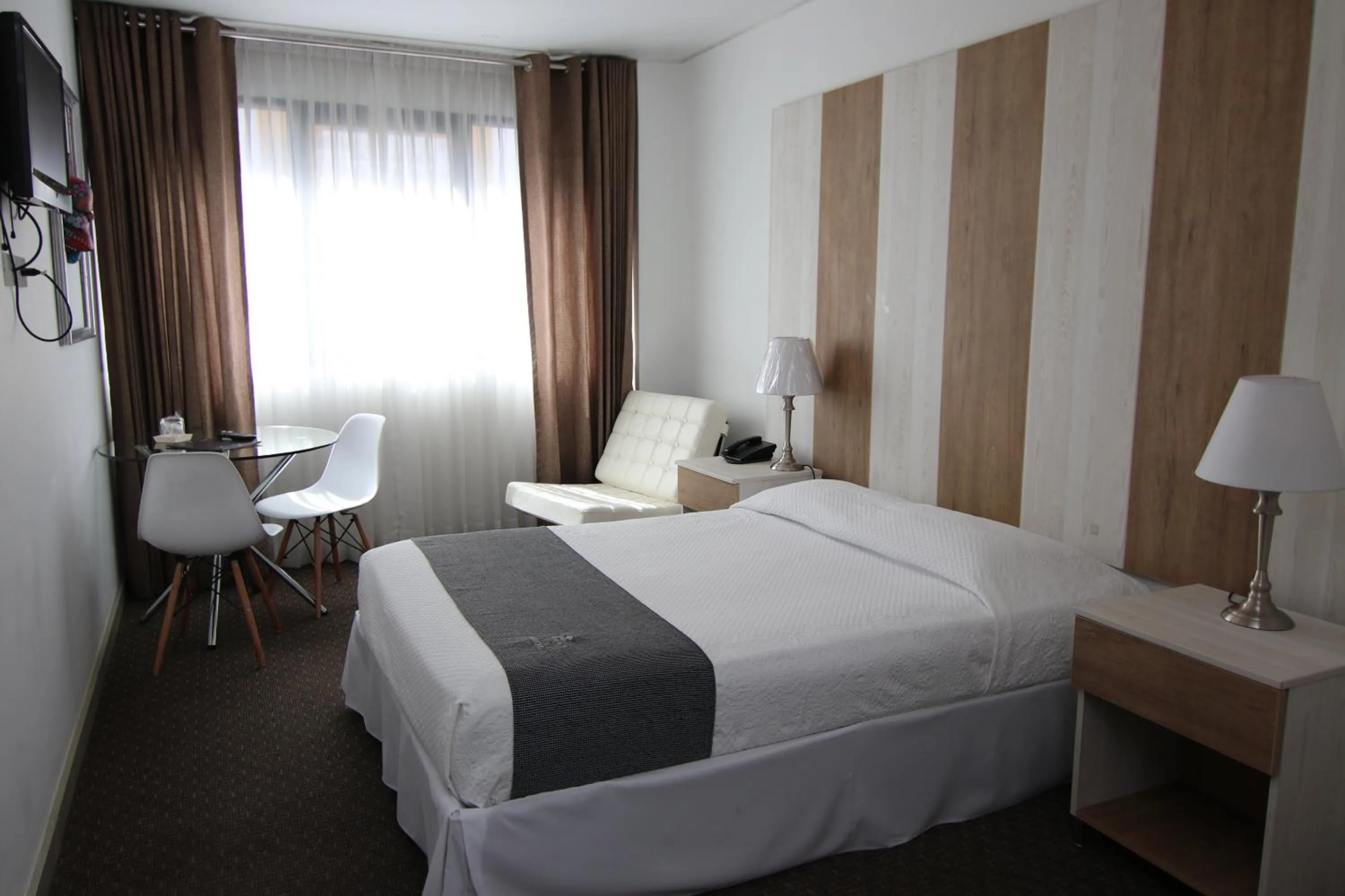 Bed in Hotel Tierrasur