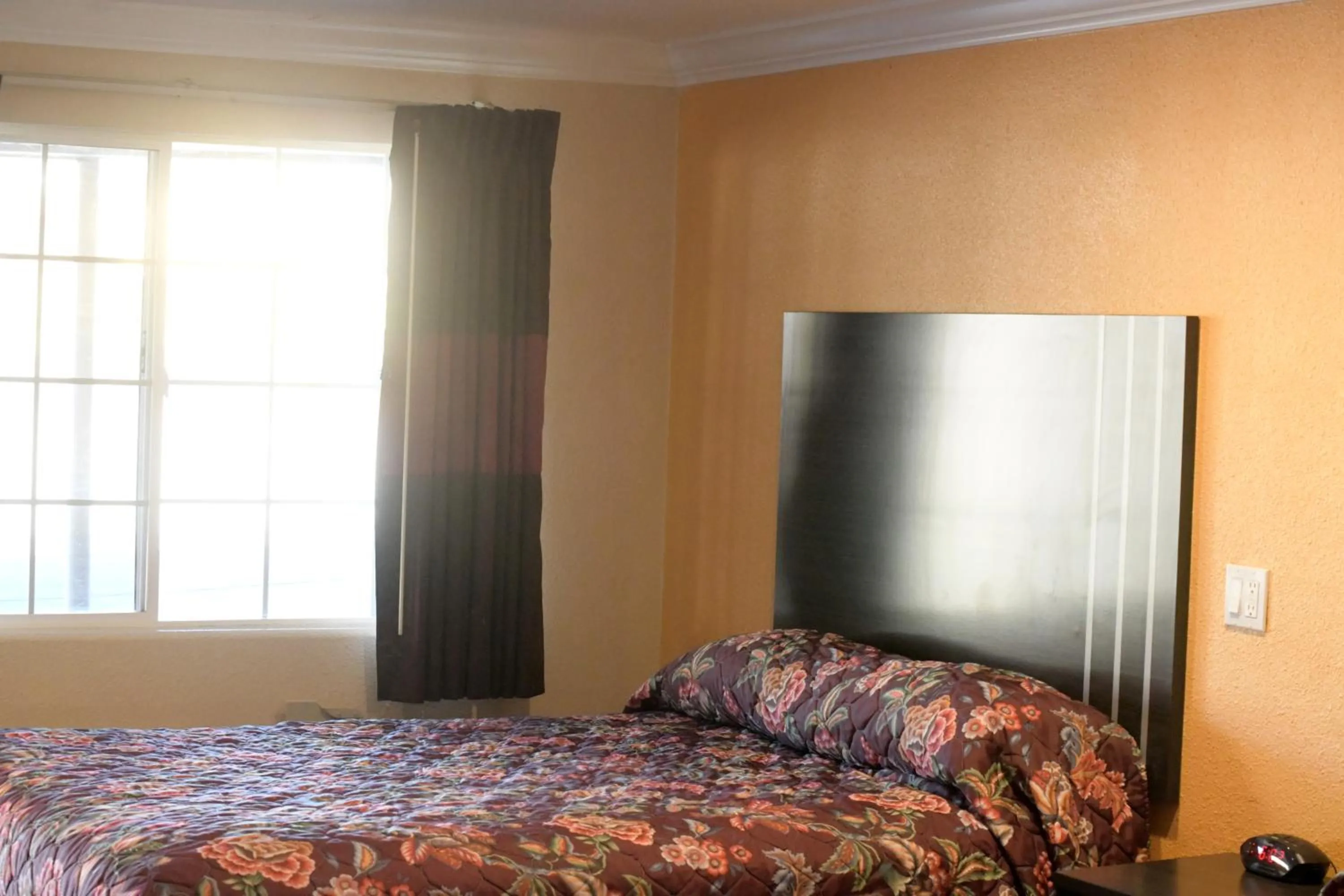 Bed in A-1 Budget Motel