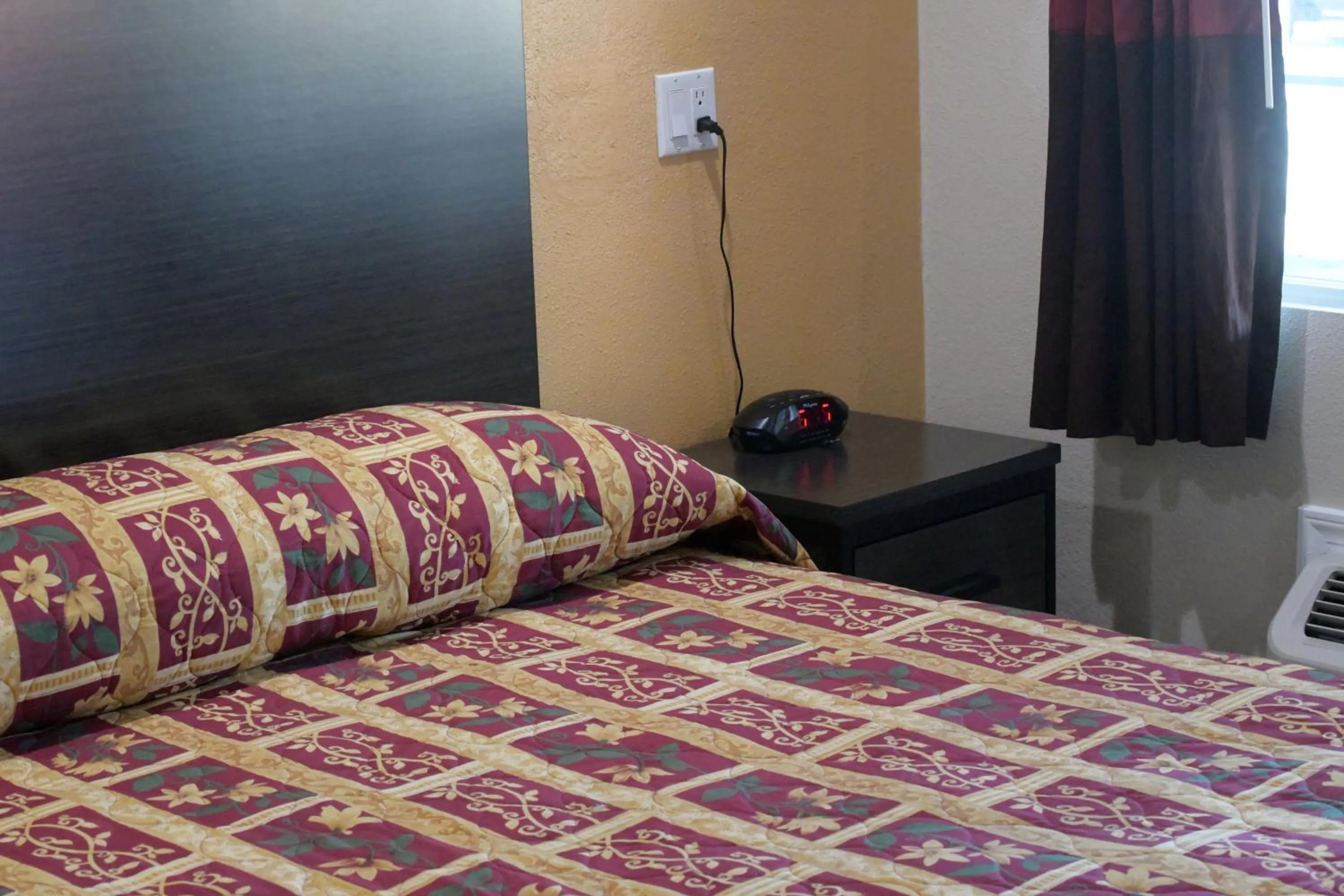 Bed in A-1 Budget Motel