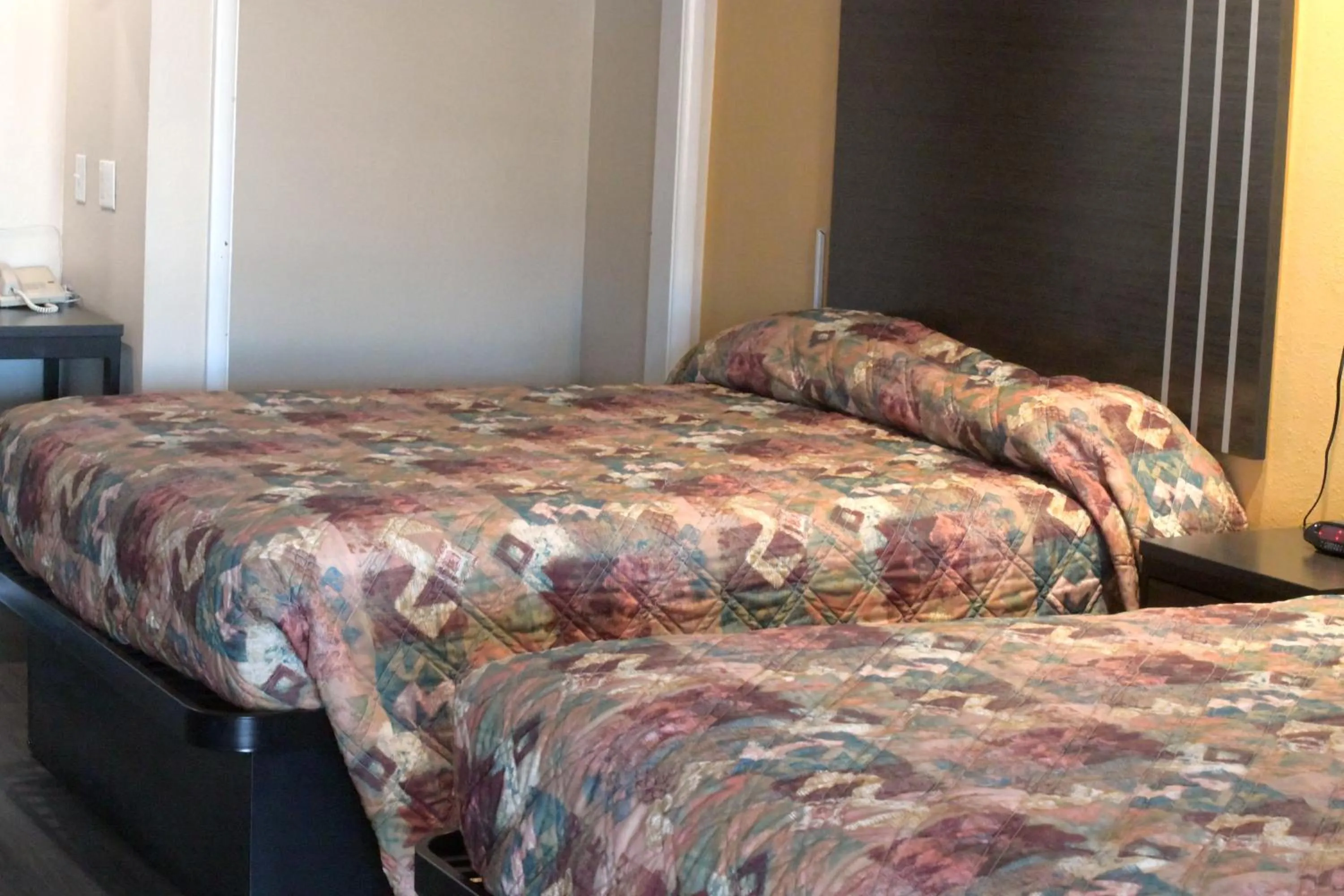 Bed in A-1 Budget Motel