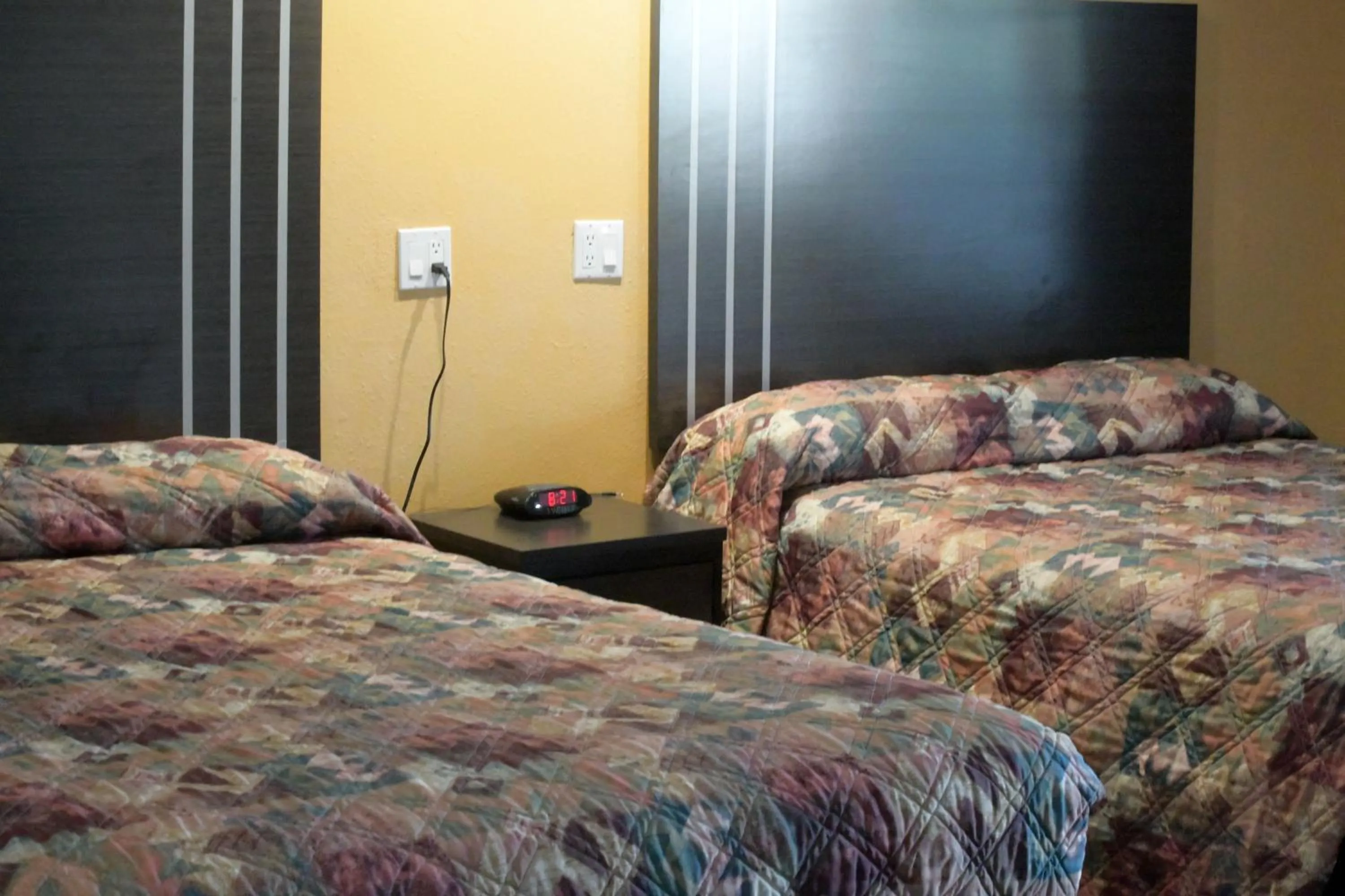 Bed in A-1 Budget Motel