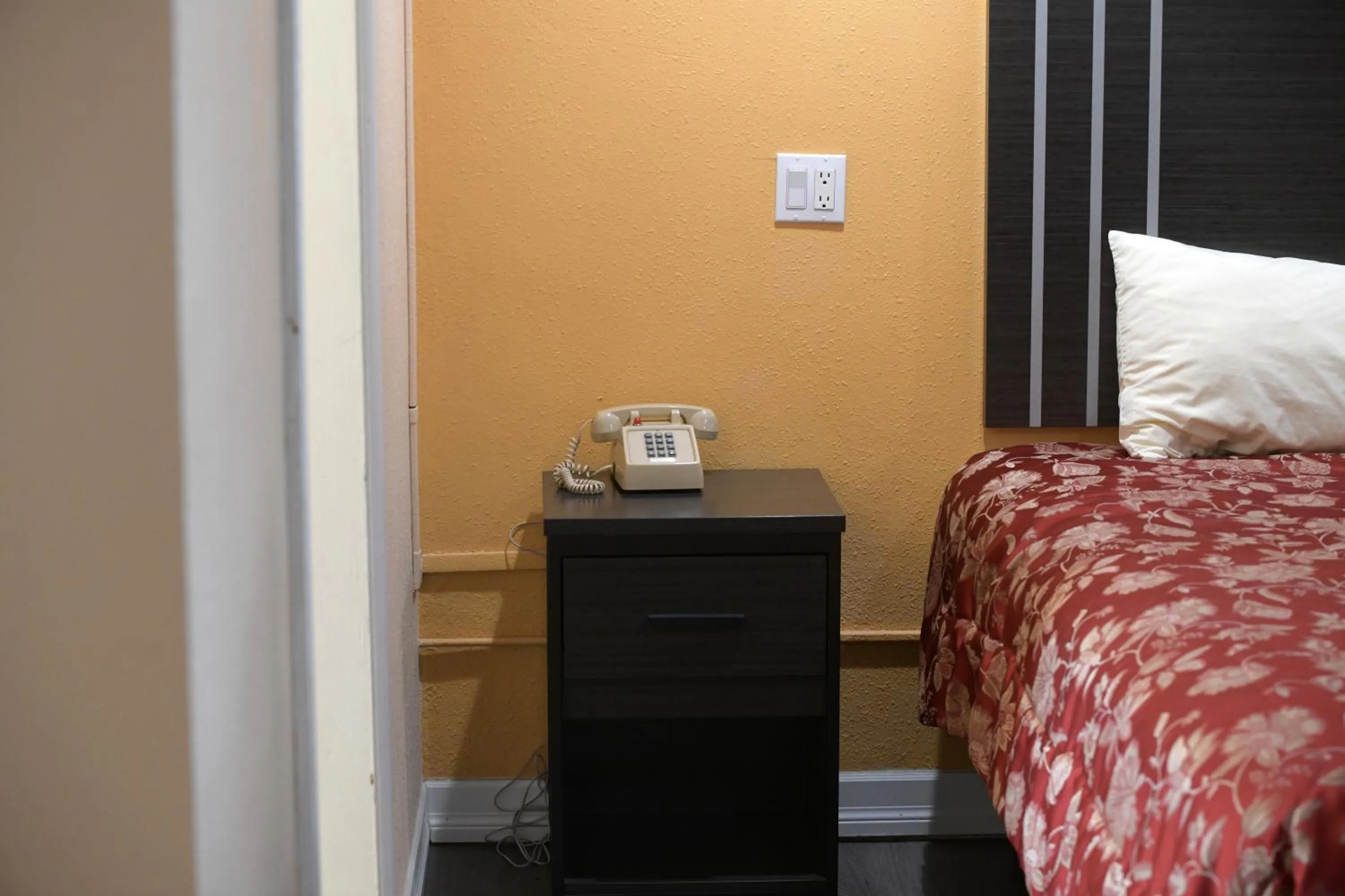 Bed in A-1 Budget Motel