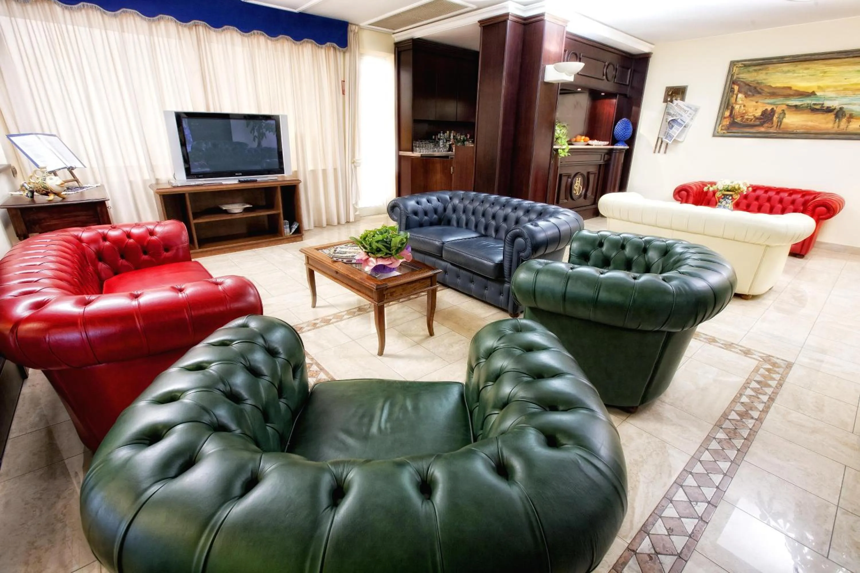 Communal lounge/ TV room in Hotel Sabbie d'Oro