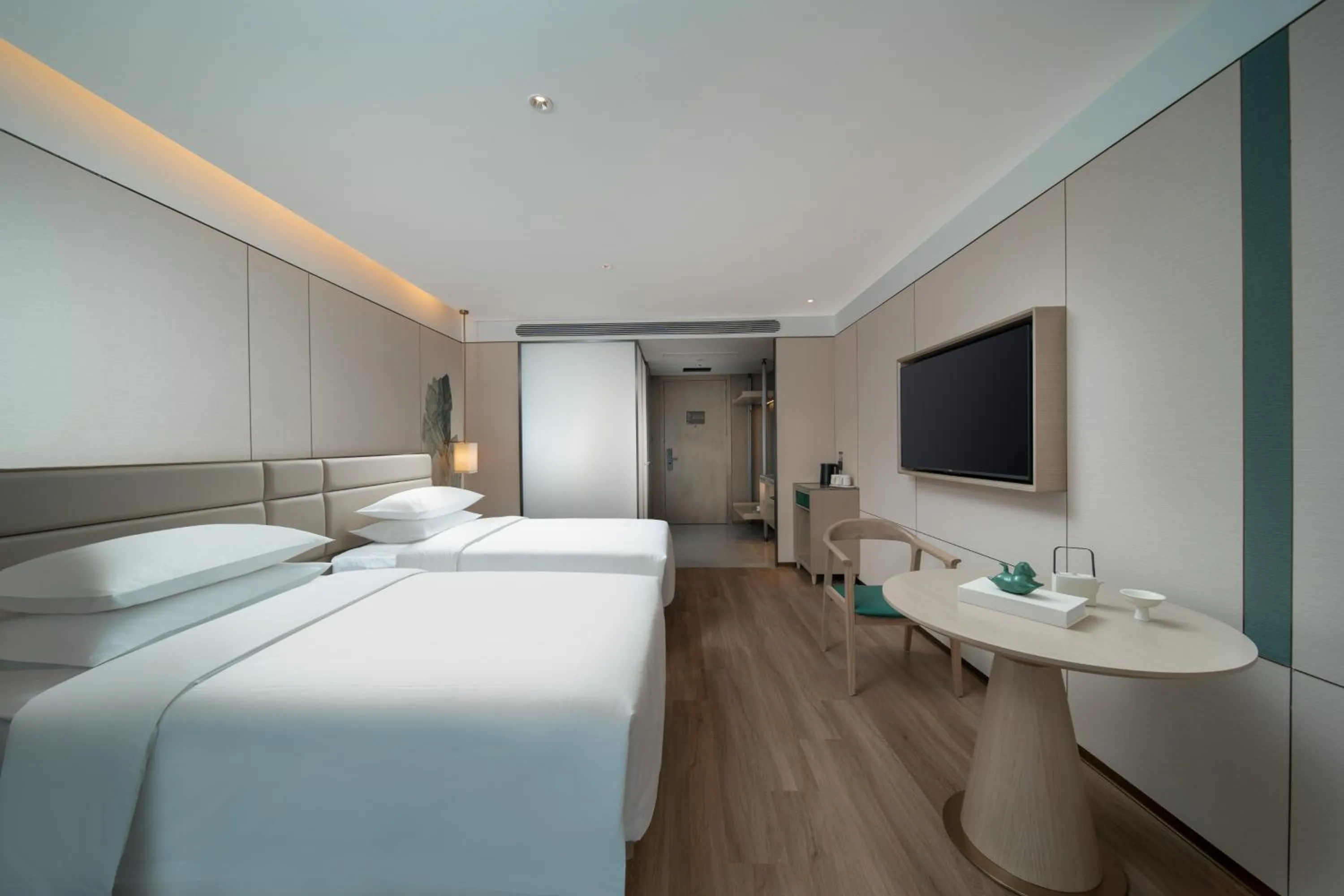 Bed in Manju Hotel Shaoxing Keqiao Wanda