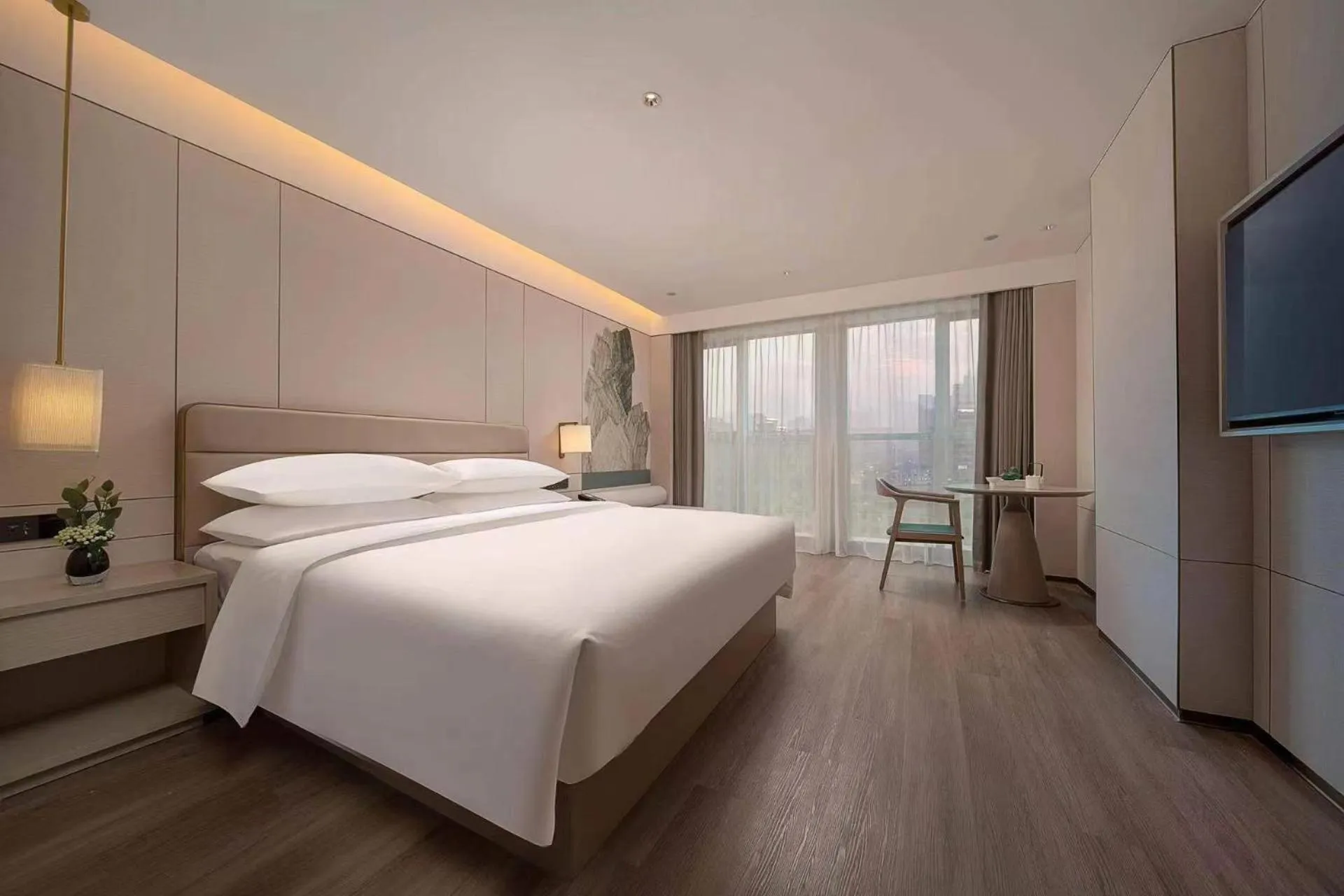 Bed in Manju Hotel Shaoxing Keqiao Wanda