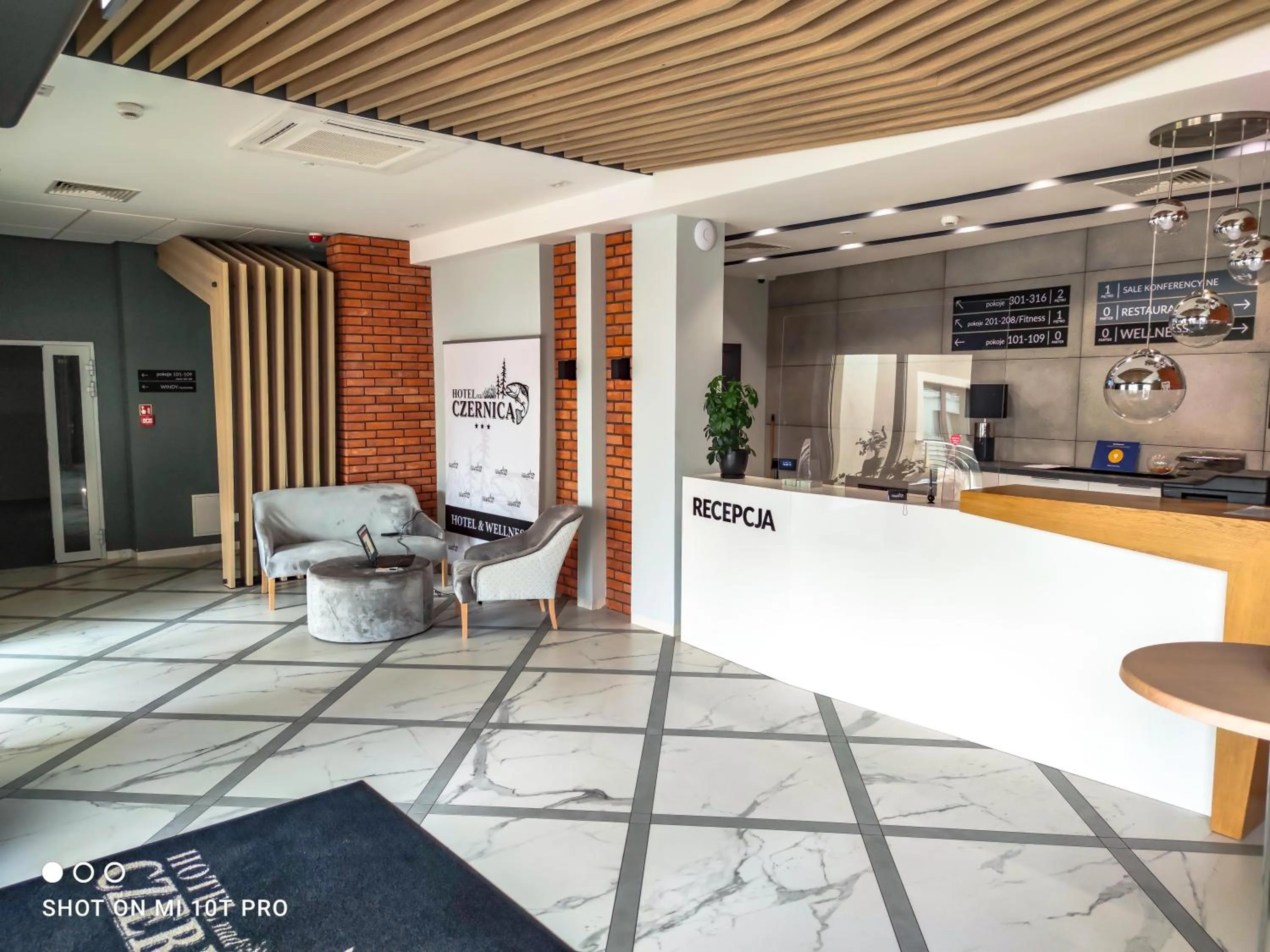 Lobby or reception in Hotel Nad Czernicą