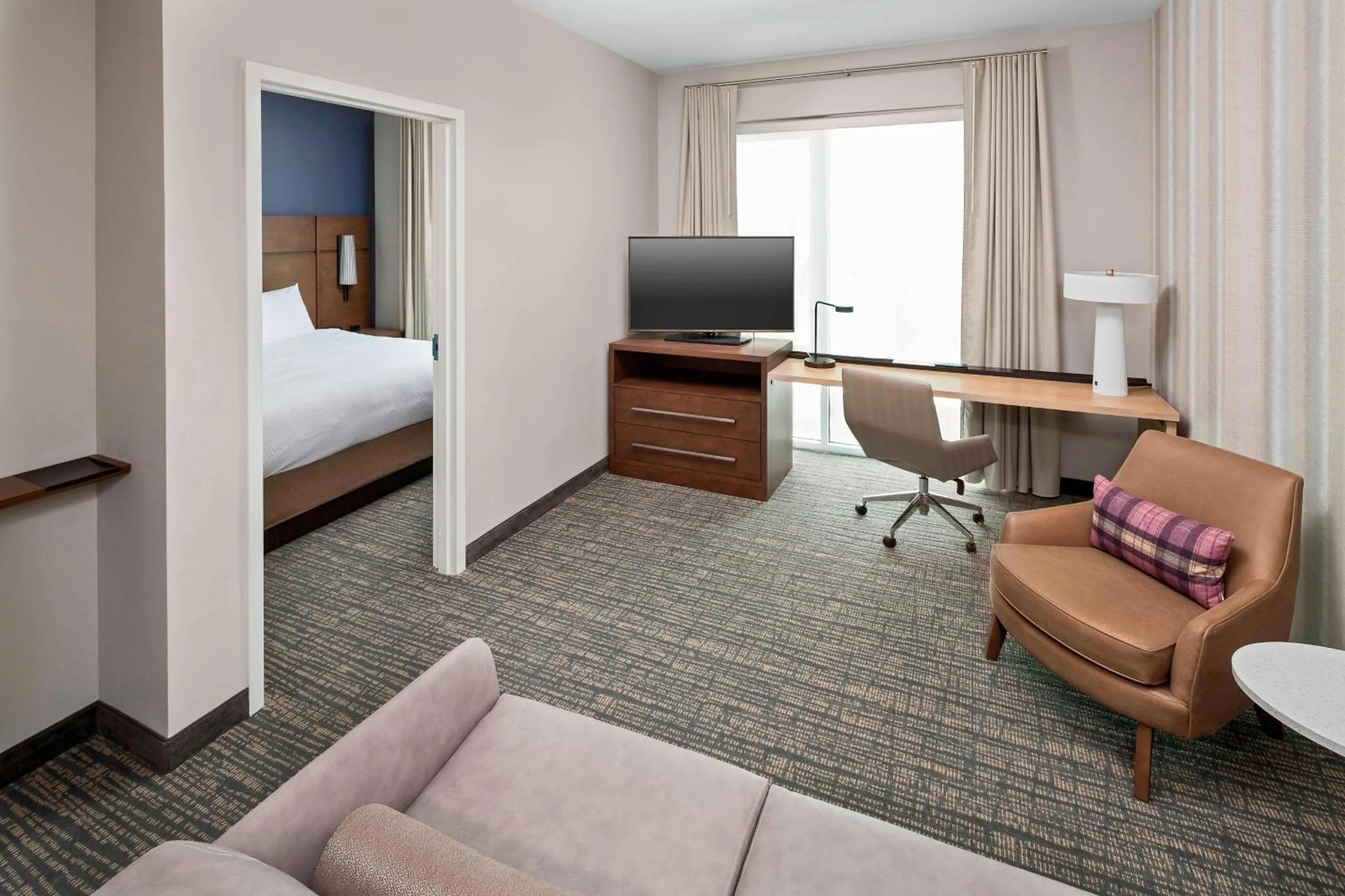 Living room, Bed in Residence Inn by Marriott Greenville Downtown