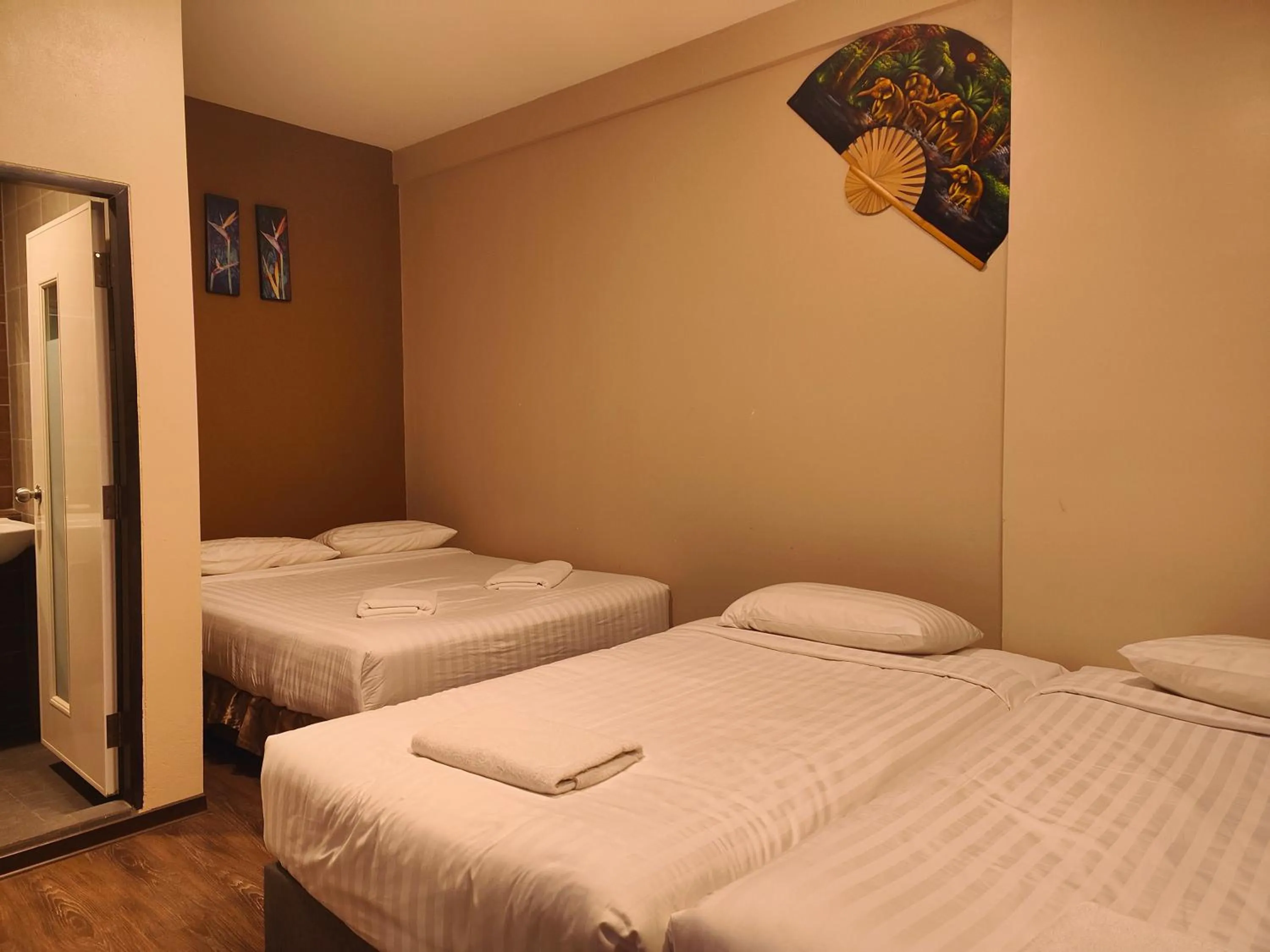 Bed in Kim Korner Hotel