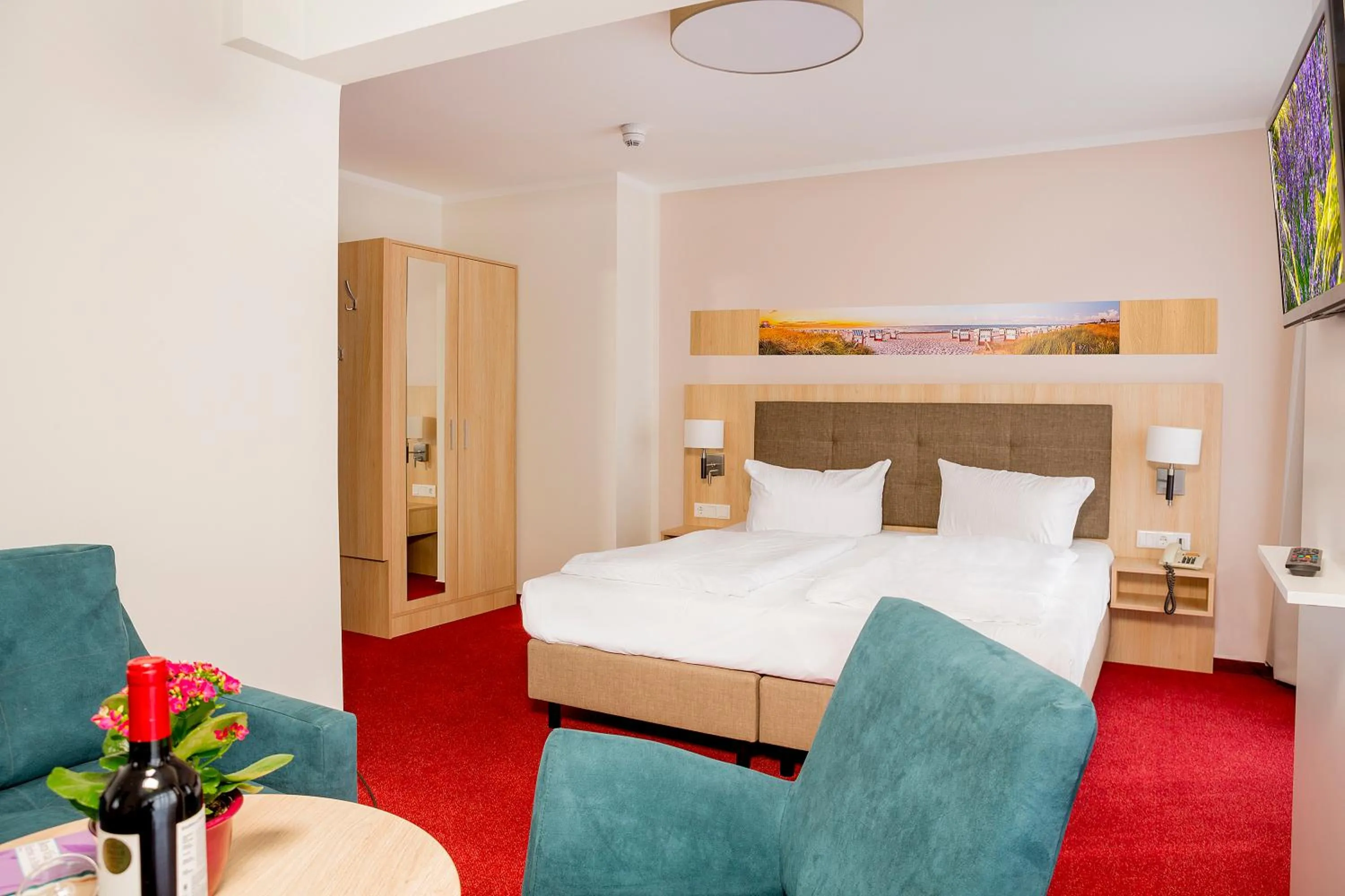 Bed in Garni Eden Hotels