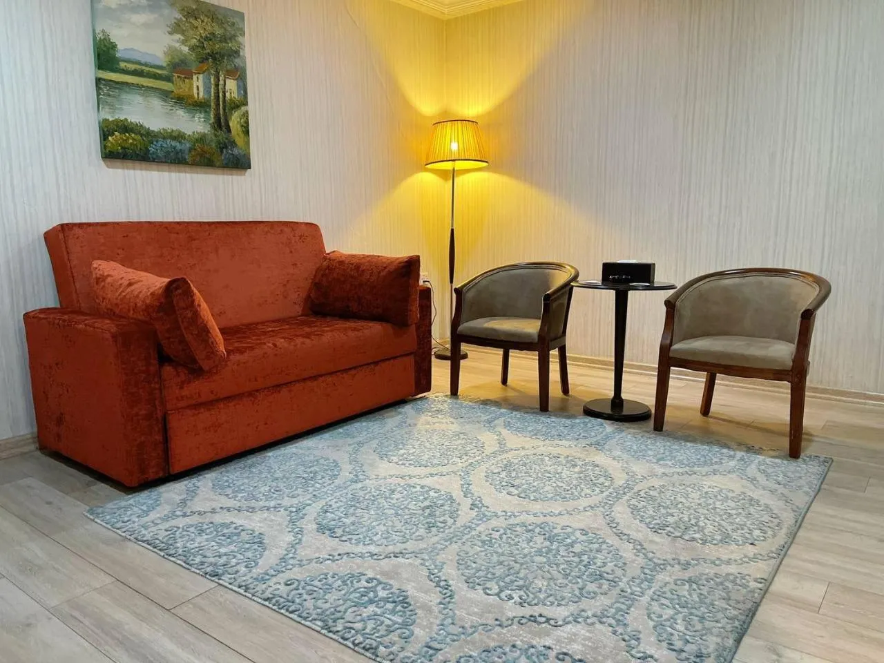 Living room in Noble Hotel