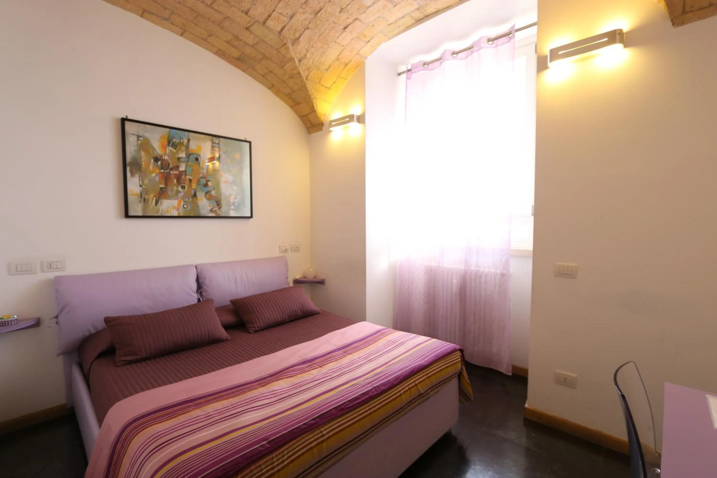 Photo of the whole room, Bed in Residenza Adriana