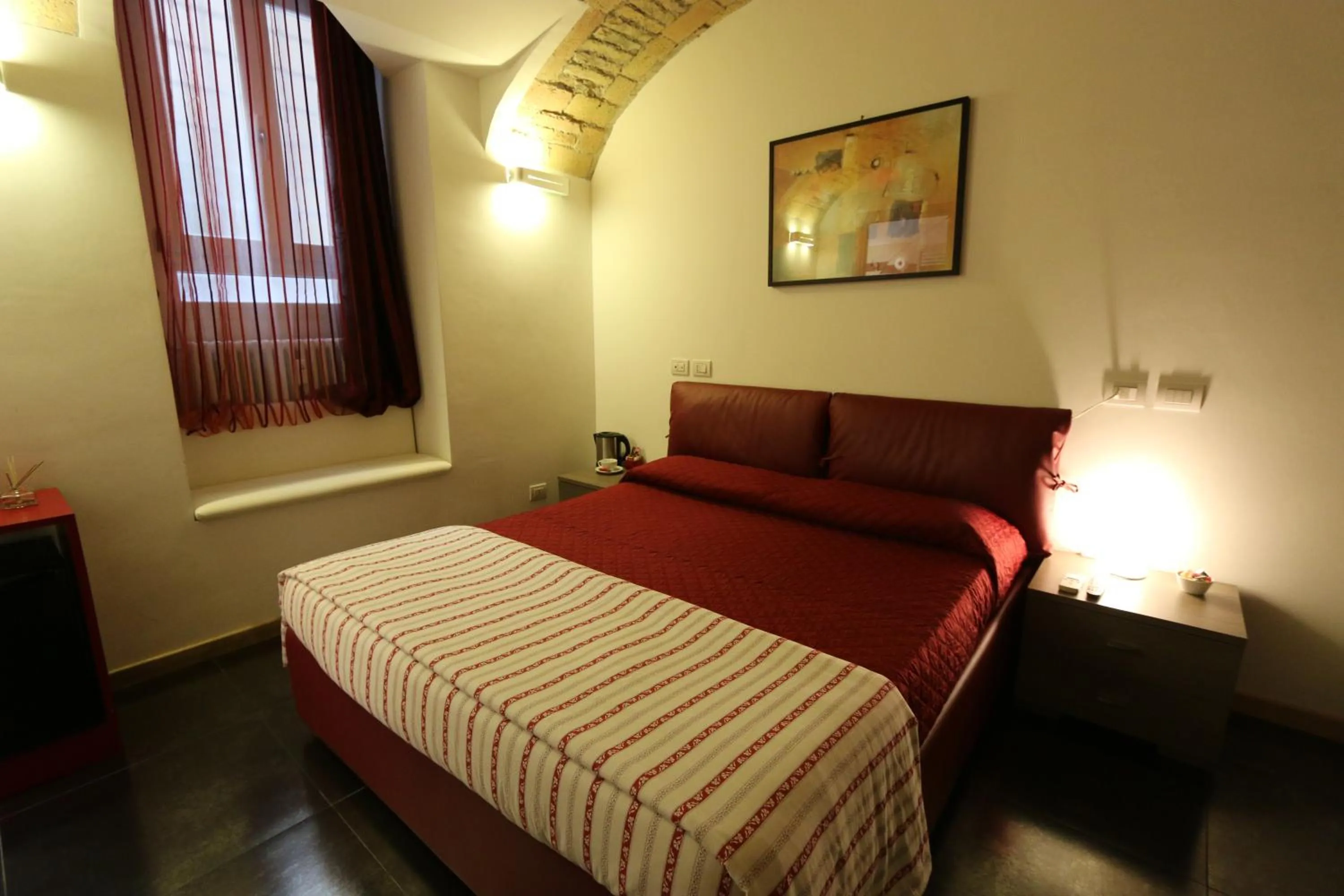 Photo of the whole room, Bed in Residenza Adriana