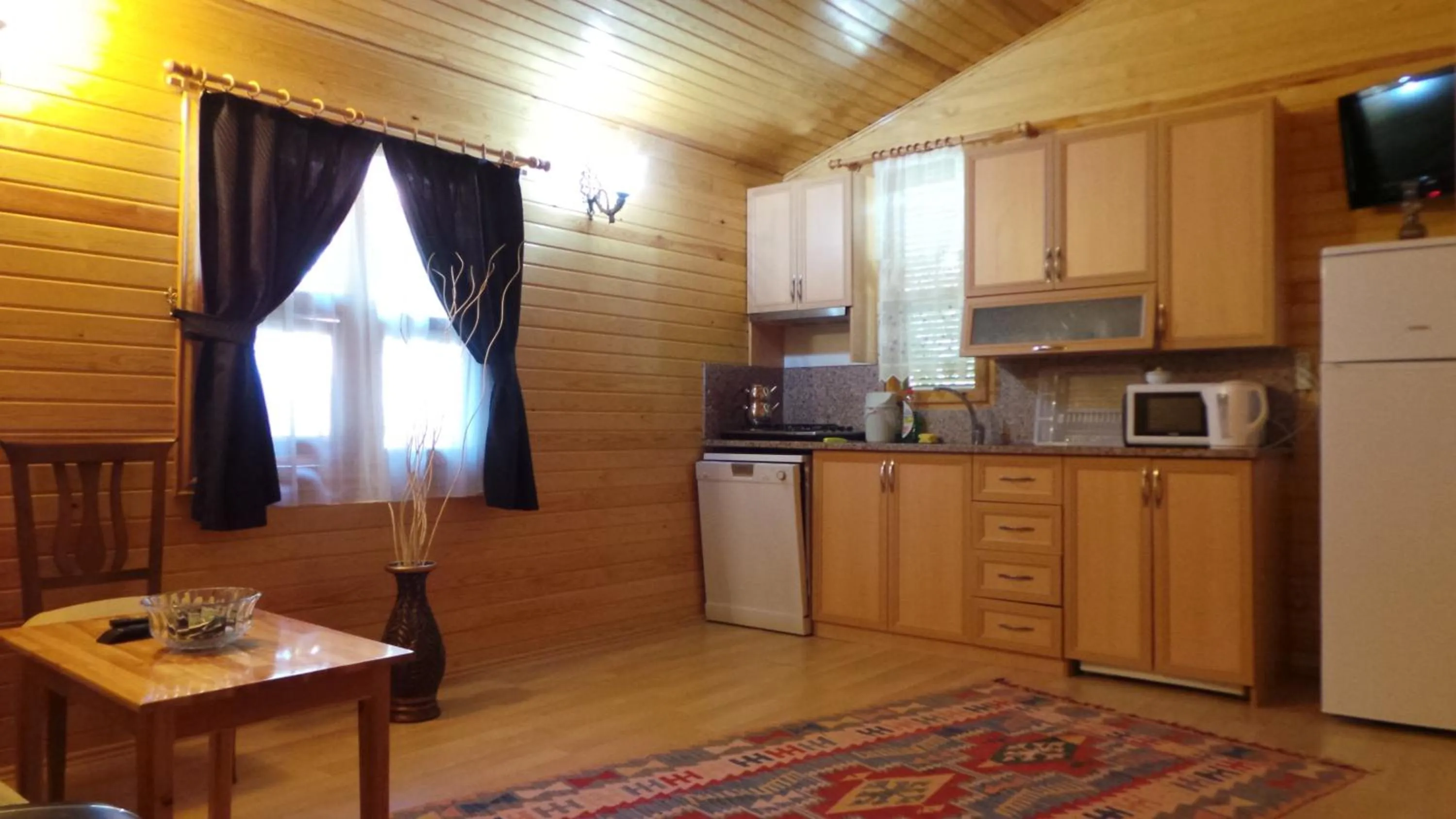 Kitchen or kitchenette in Mercan Bungalow