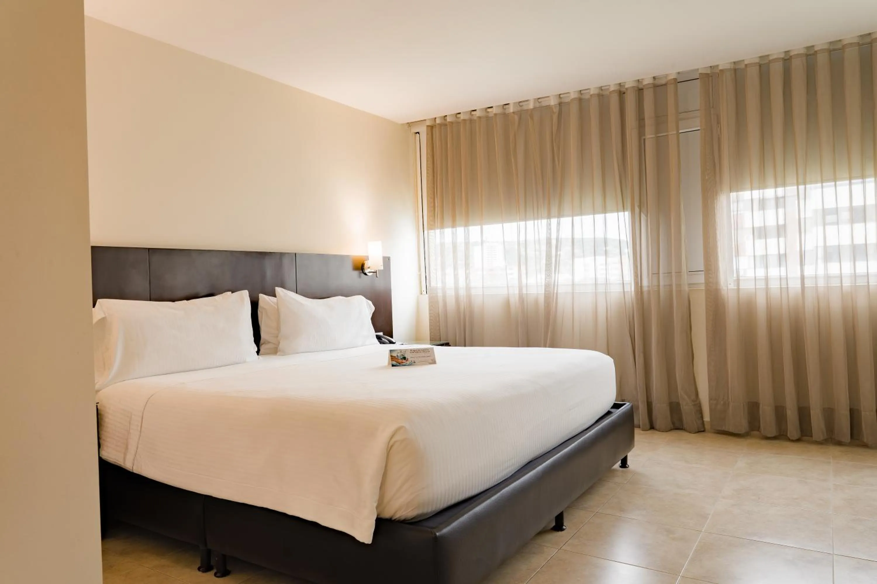 Bed in Hotel Casino Internacional