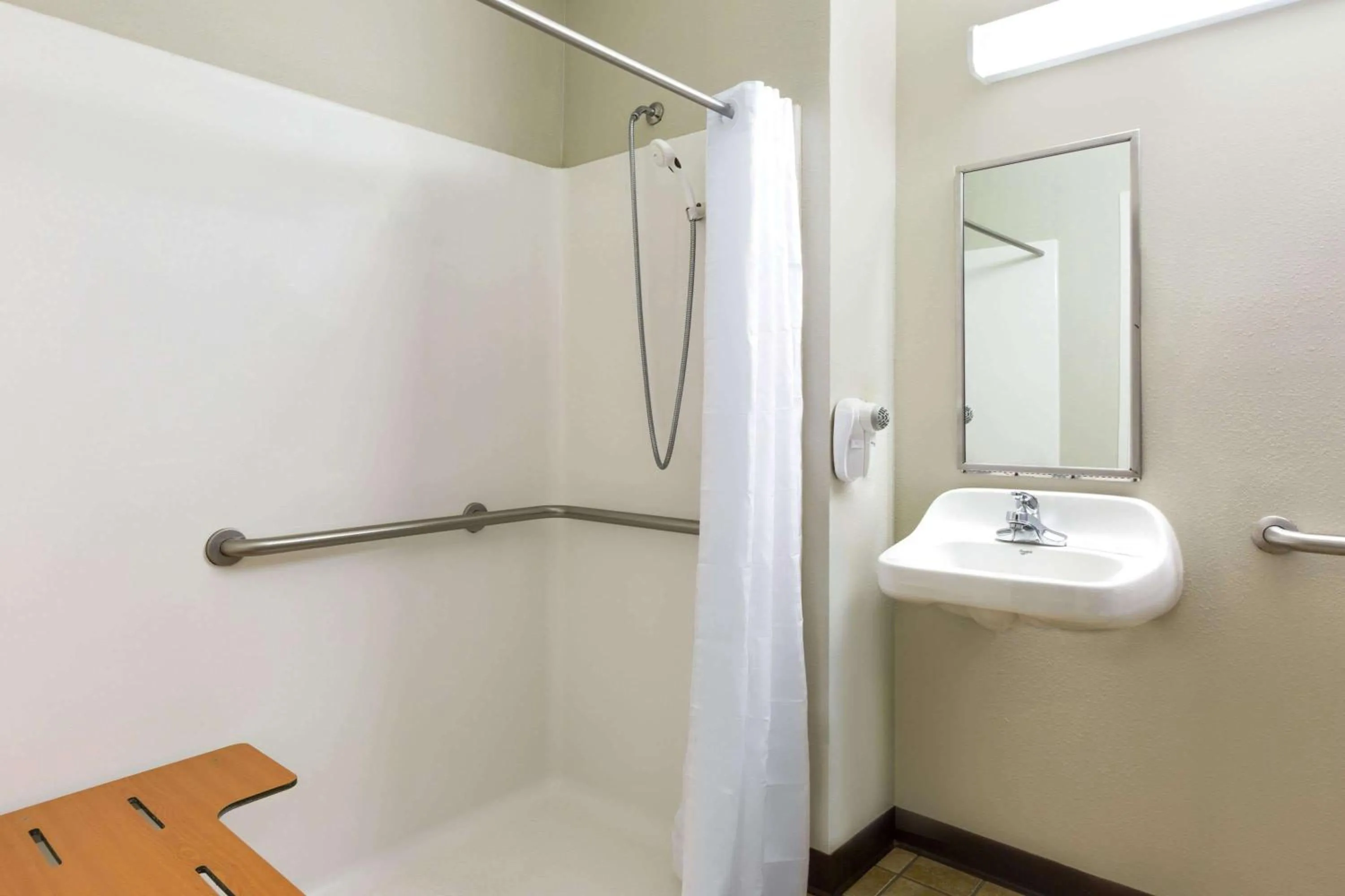Shower in Microtel Inn & Suites by Wyndham Tuscaloosa