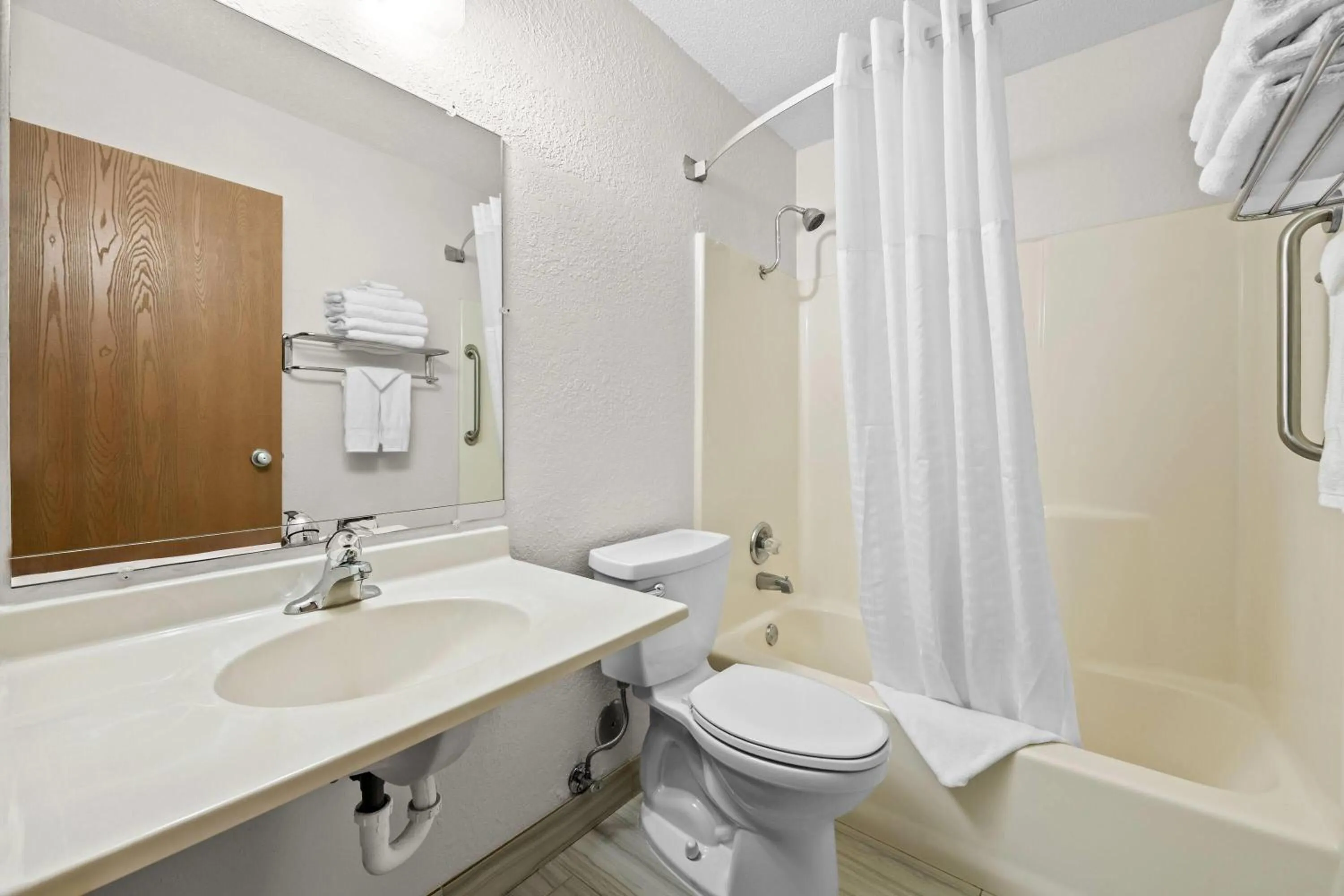 Bathroom in Super 8 by Wyndham Alexandria MN