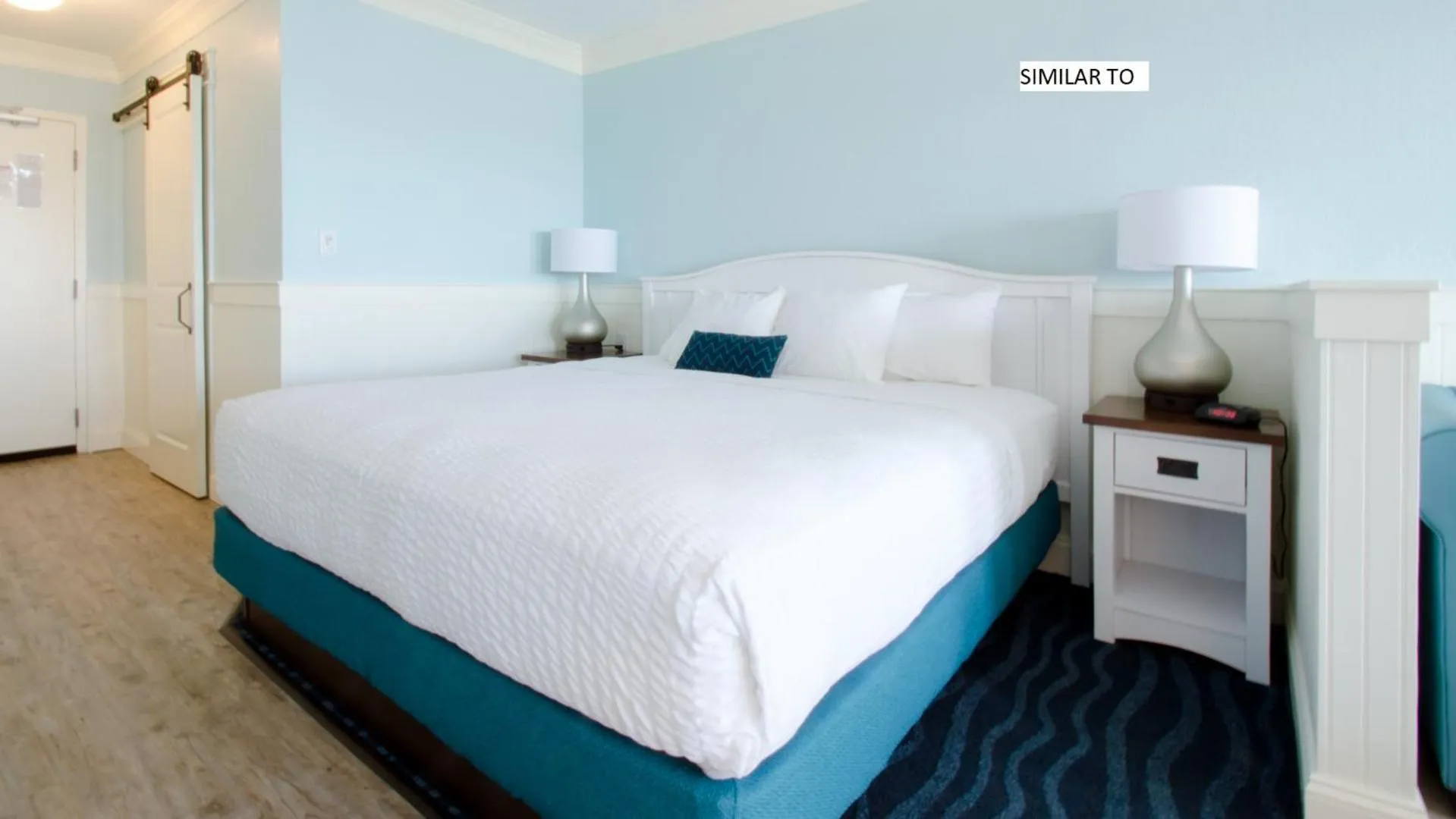 Bed in John Yancey Oceanfront Inn