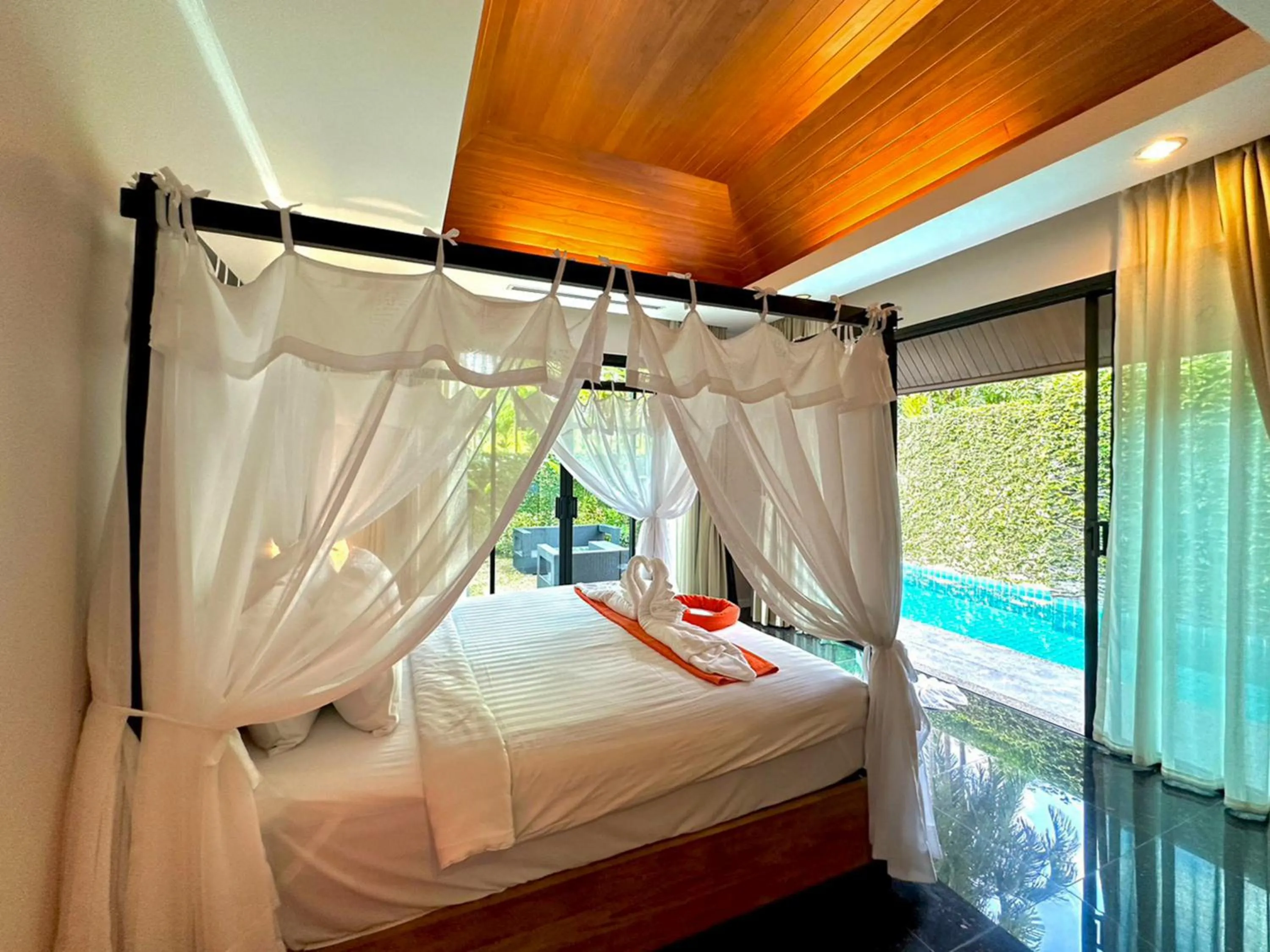 Bed in The Kiri Villas Resort
