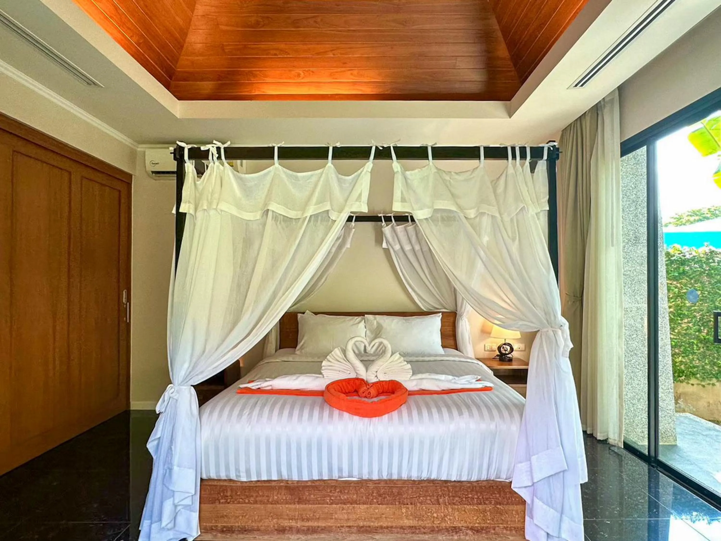 Bed in The Kiri Villas Resort