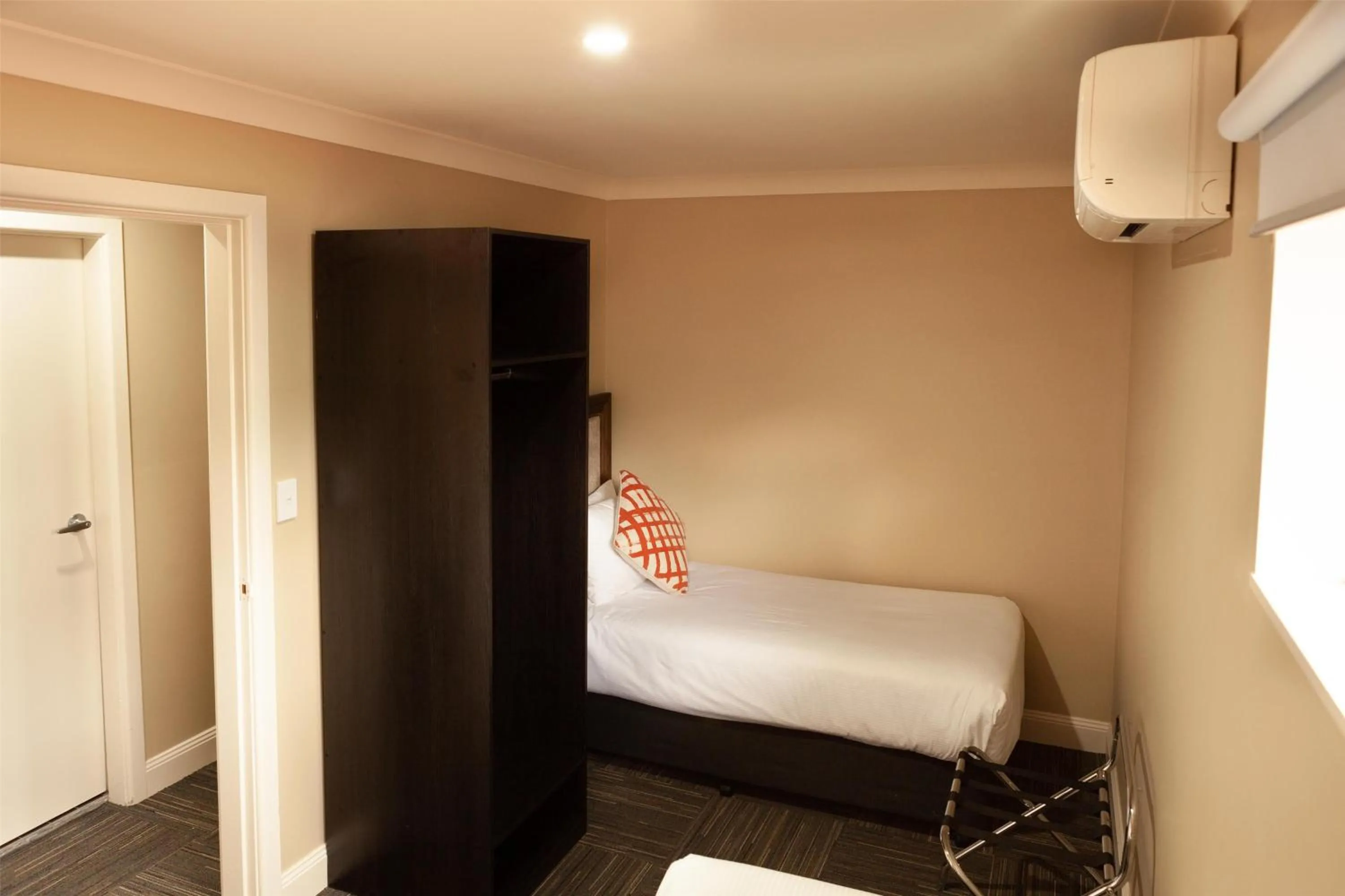 Bedroom, Bed in Nightcap at Archer Hotel