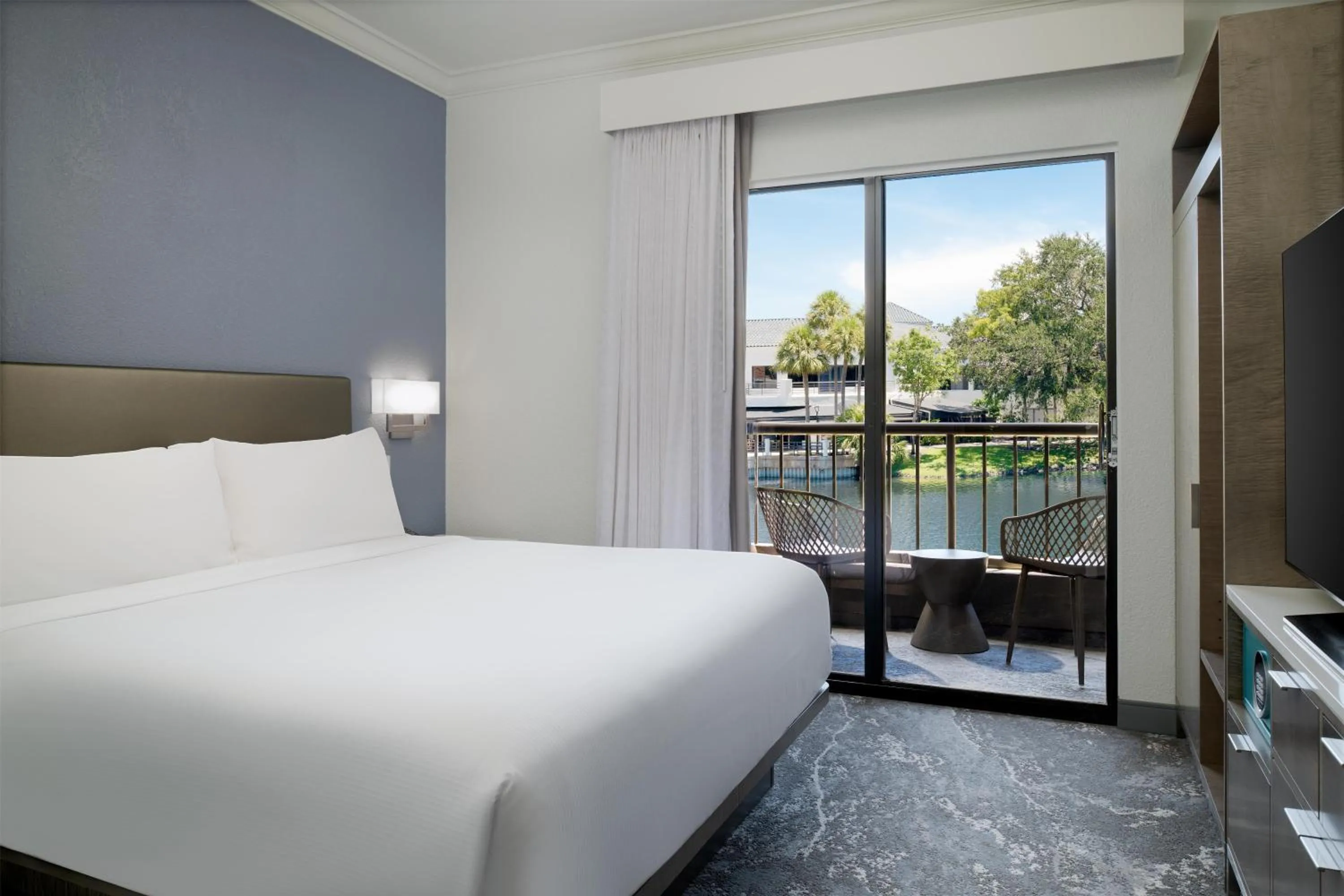 Bed in Hilton Boca Raton Suites