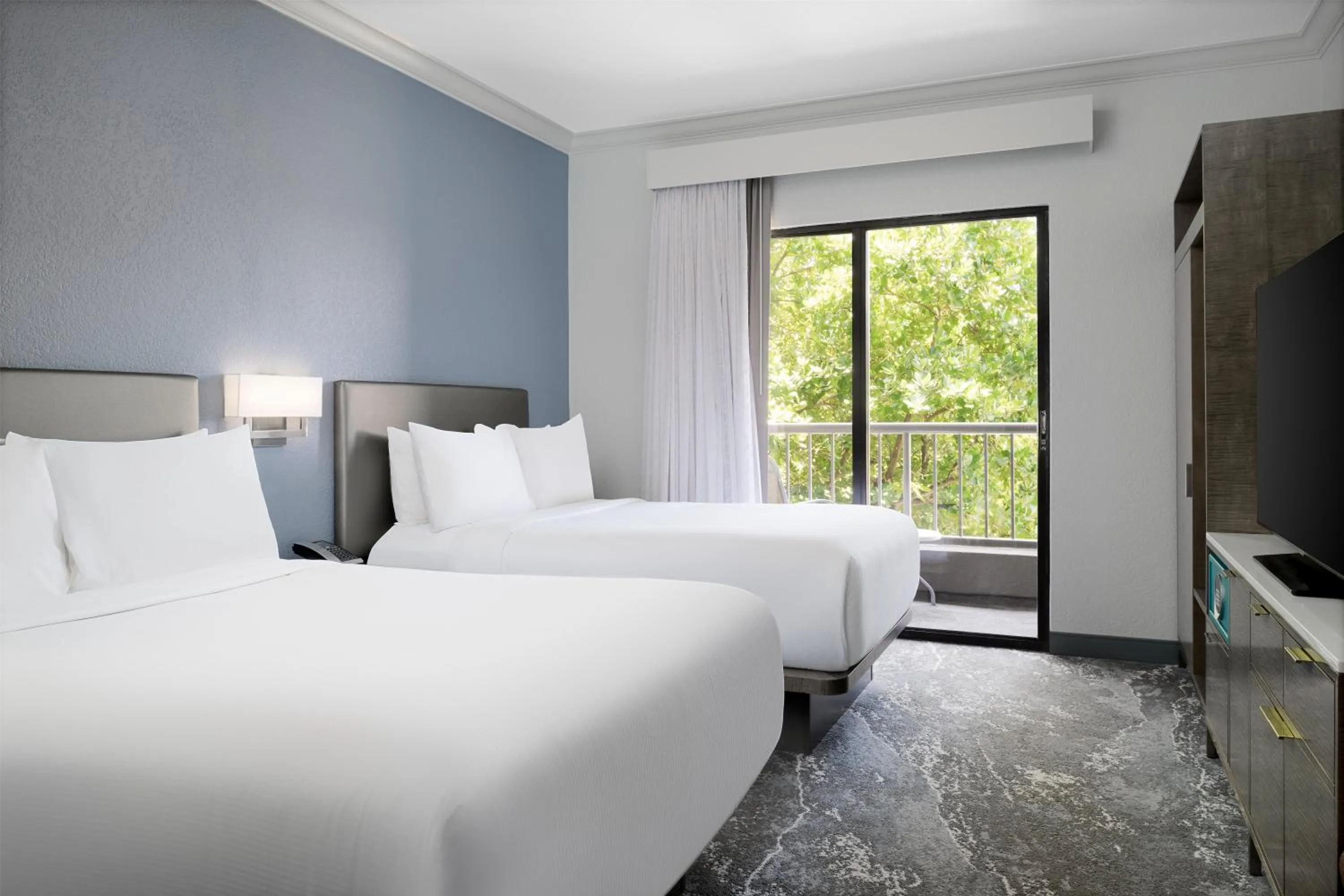 Bed in Hilton Boca Raton Suites