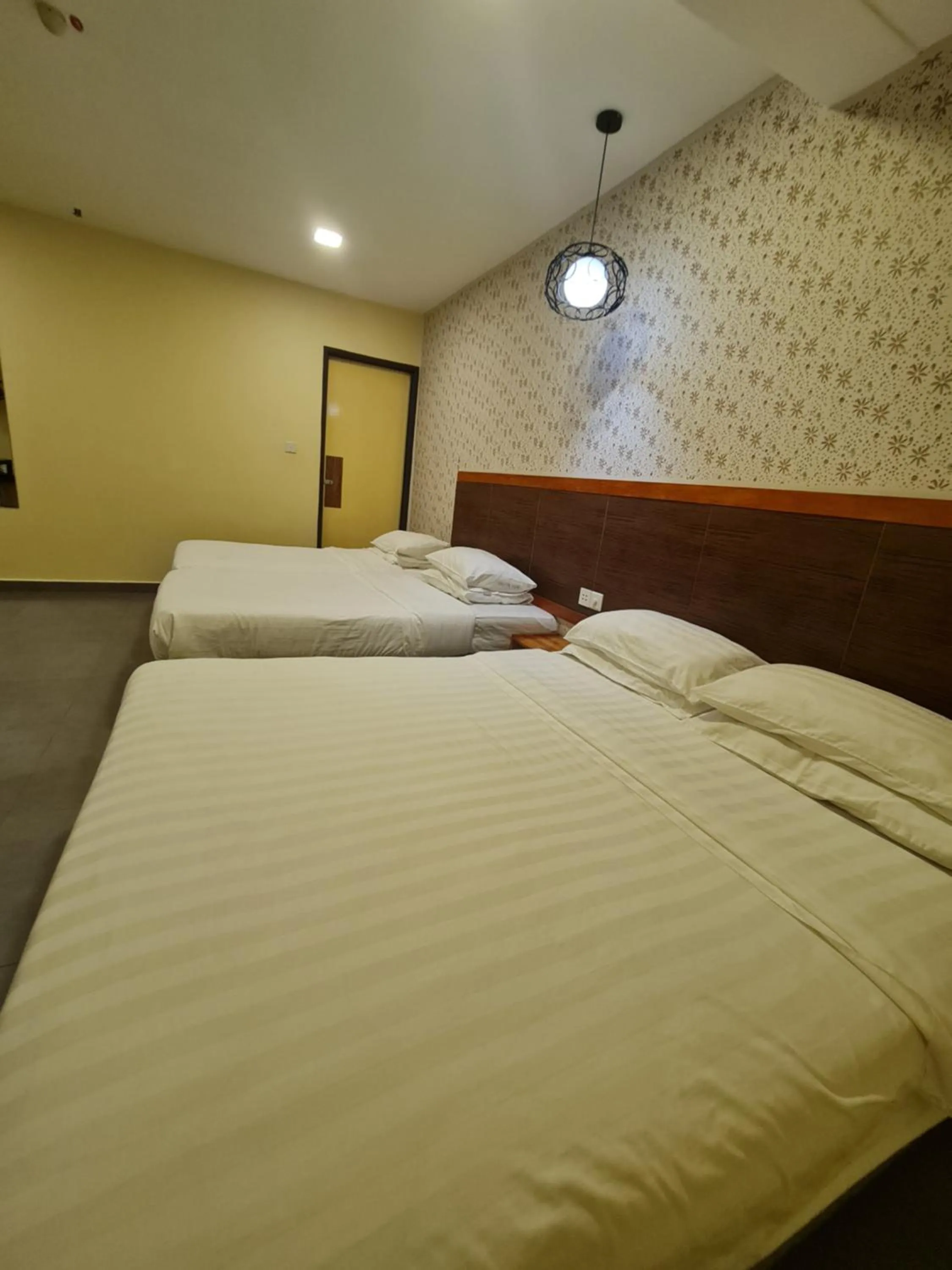 Bed in Hotel Bestari