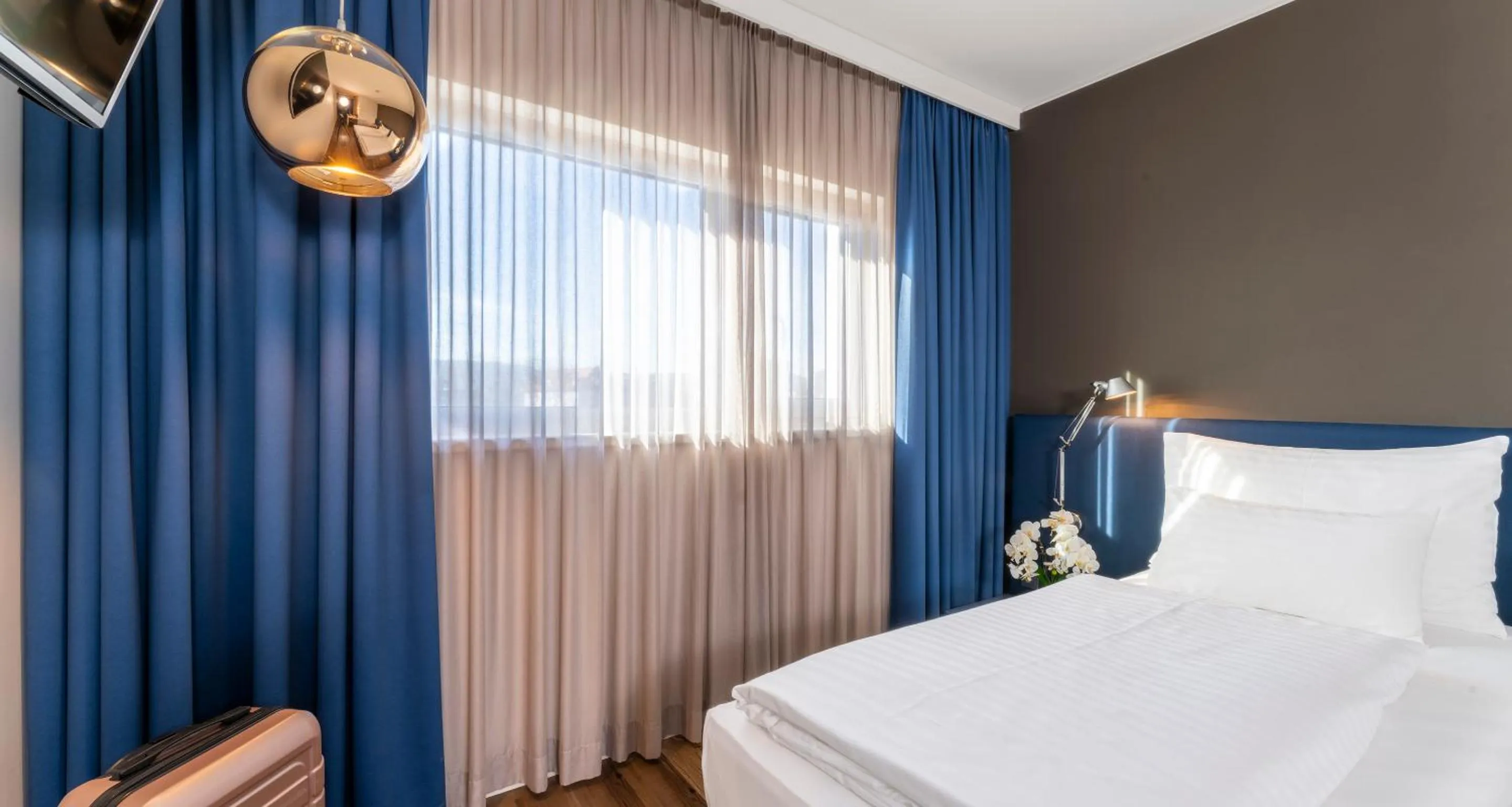 Photo of the whole room, Bed in PLAZA INN Graz