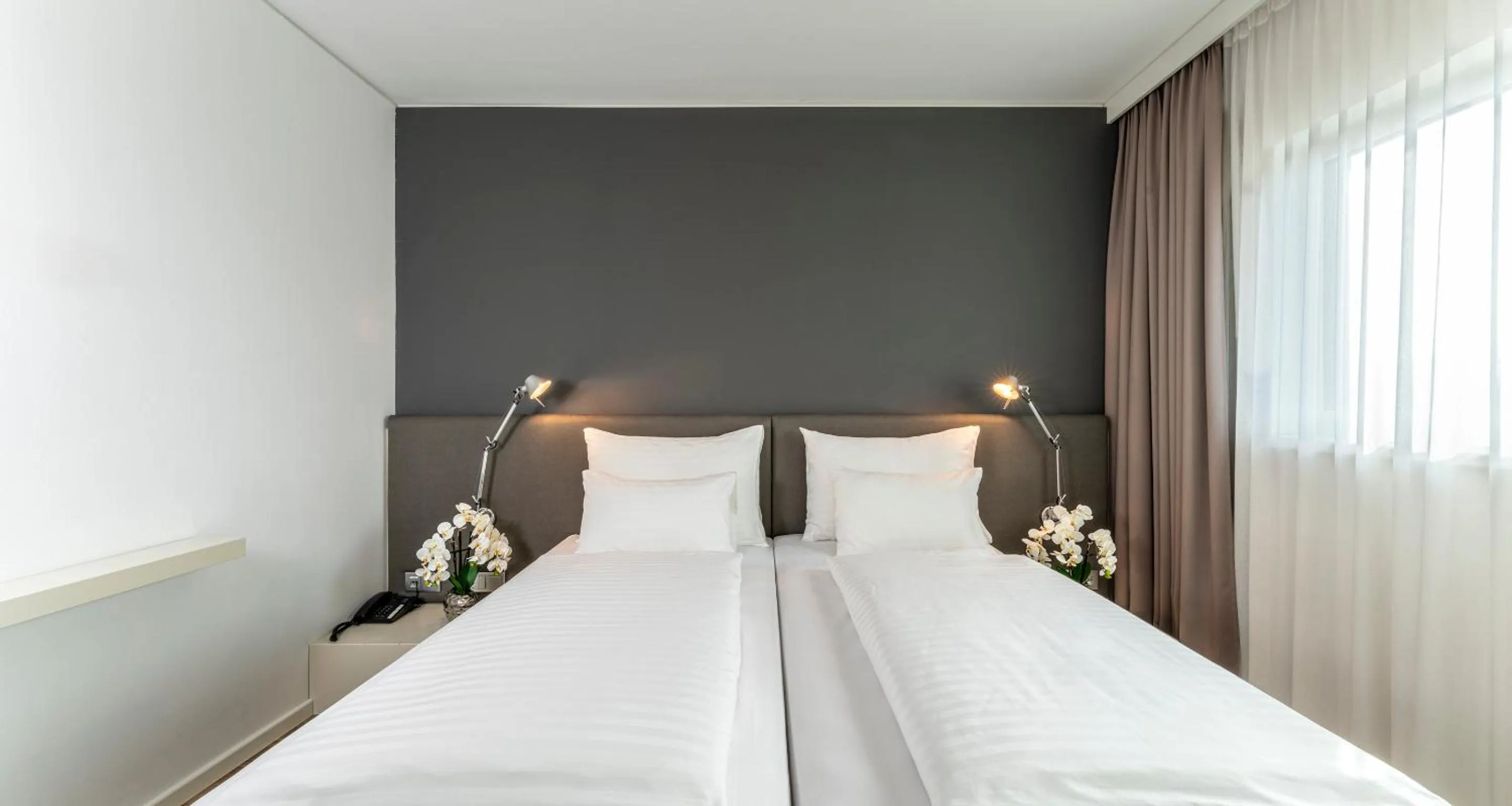 Bed in PLAZA INN Graz