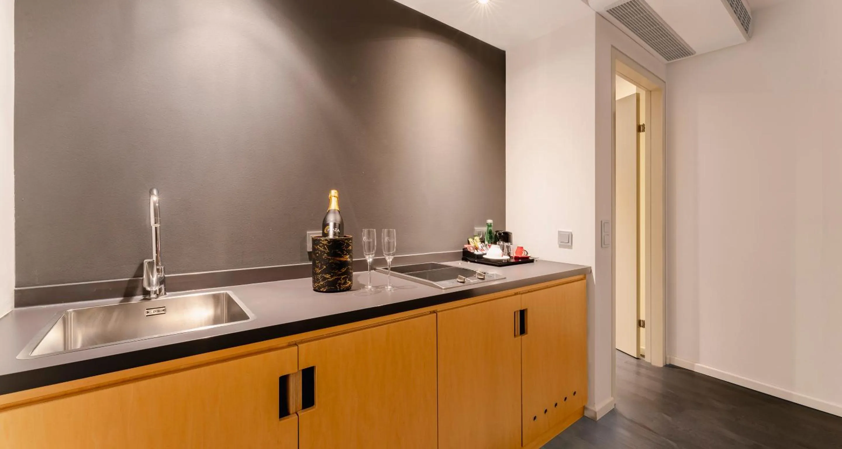 Kitchen or kitchenette in PLAZA INN Graz