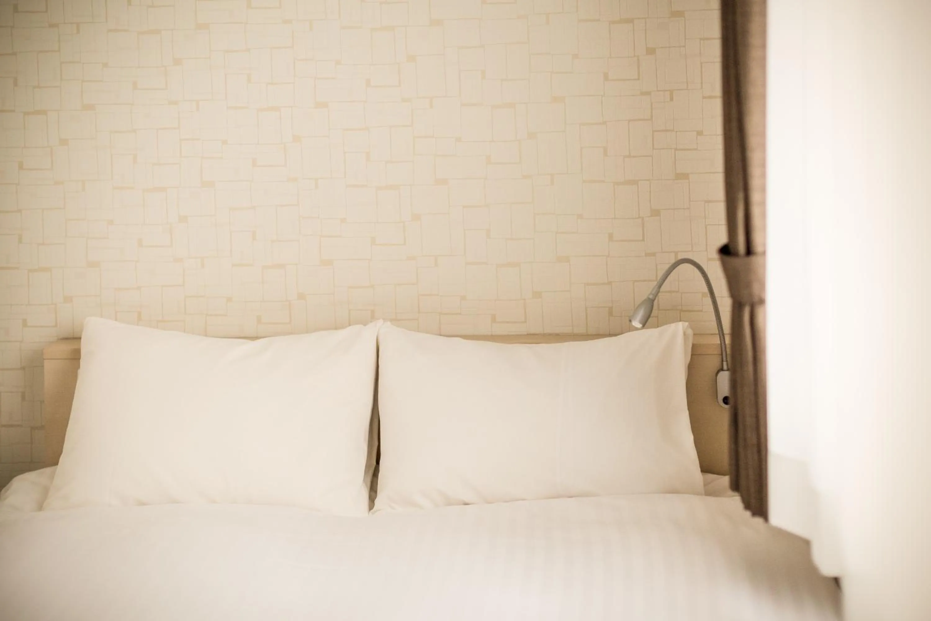 Photo of the whole room, Bed in EIWA PLACE HOTEL Hakata