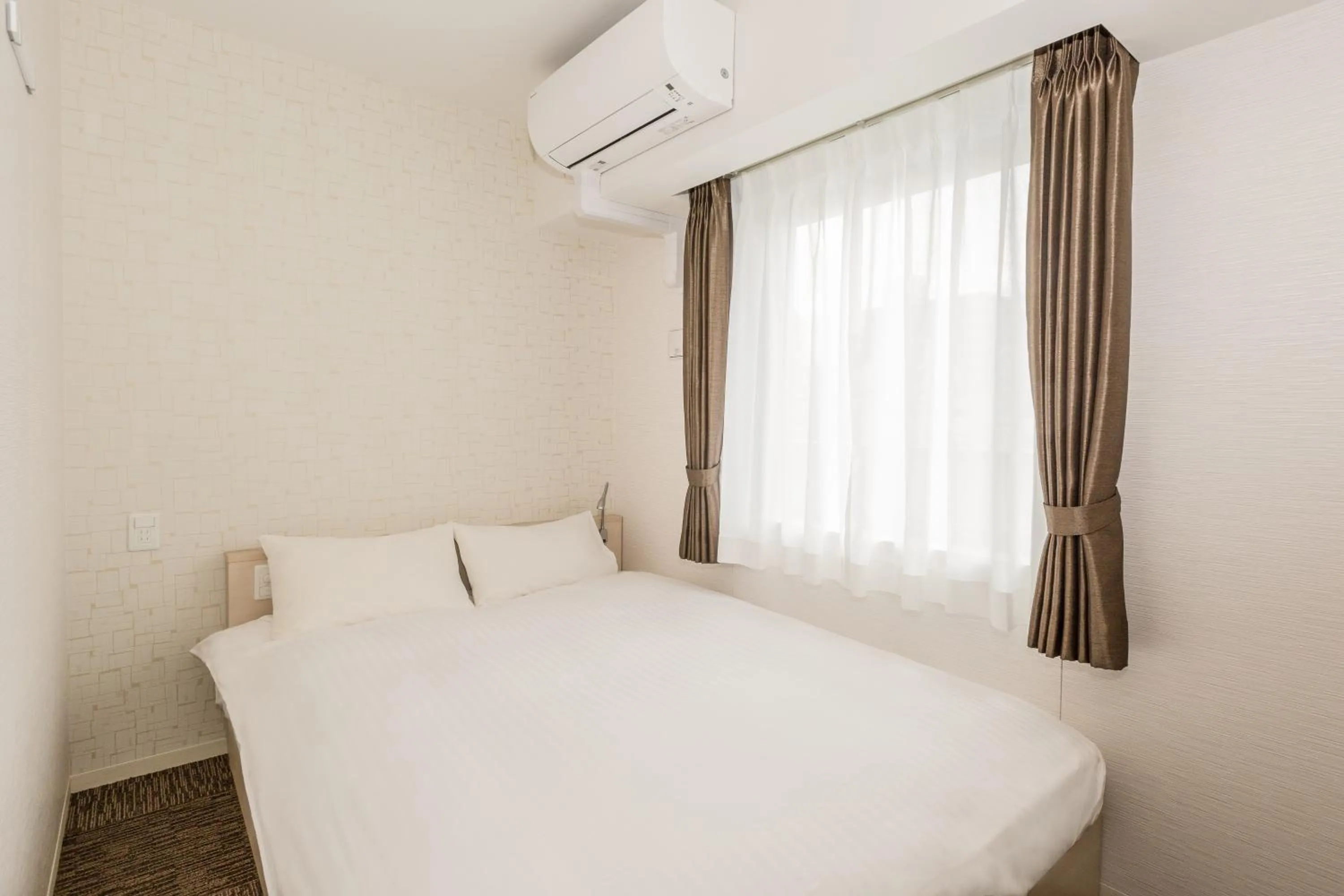 Photo of the whole room, Bed in EIWA PLACE HOTEL Hakata