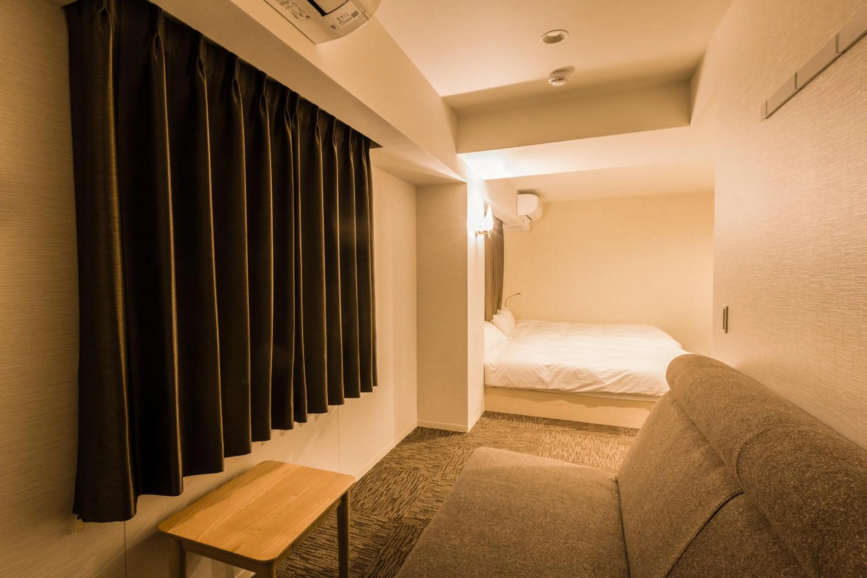 Photo of the whole room, Bed in EIWA PLACE HOTEL Hakata