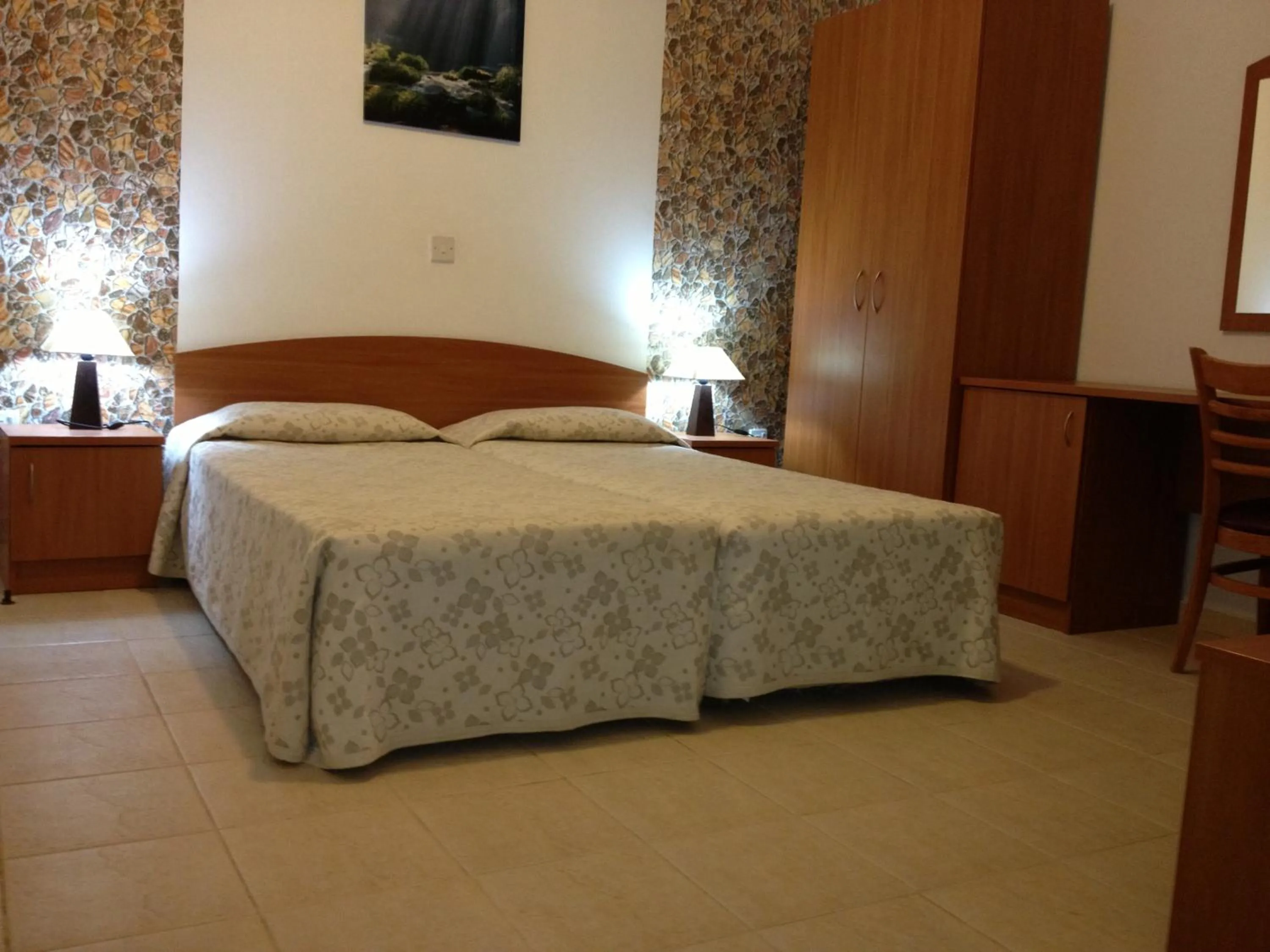 Bedroom in Palates Hotel